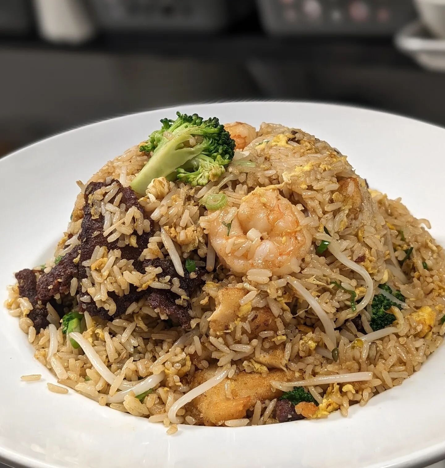 If you're someone that likes a little bit of everything, ask your server to make your dish a combination! 
For just $4 more you can have chicken, shrimp and beef! (On select dishes) 

Pictured here is the Hat Fried Rice and Lo Mein.