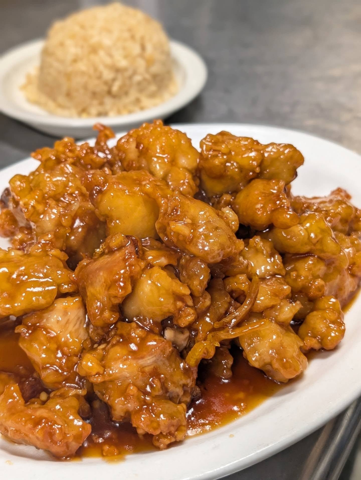 We hope everyone had a great weekend! 🇺🇸

We're open and ready to serve you some delicious dishes! On showcase we have our delectable Orange chicken. 😍 
Candied orange rinds and our housemade sweet sticky sauce has the perfect zing. 

📍The Rice H