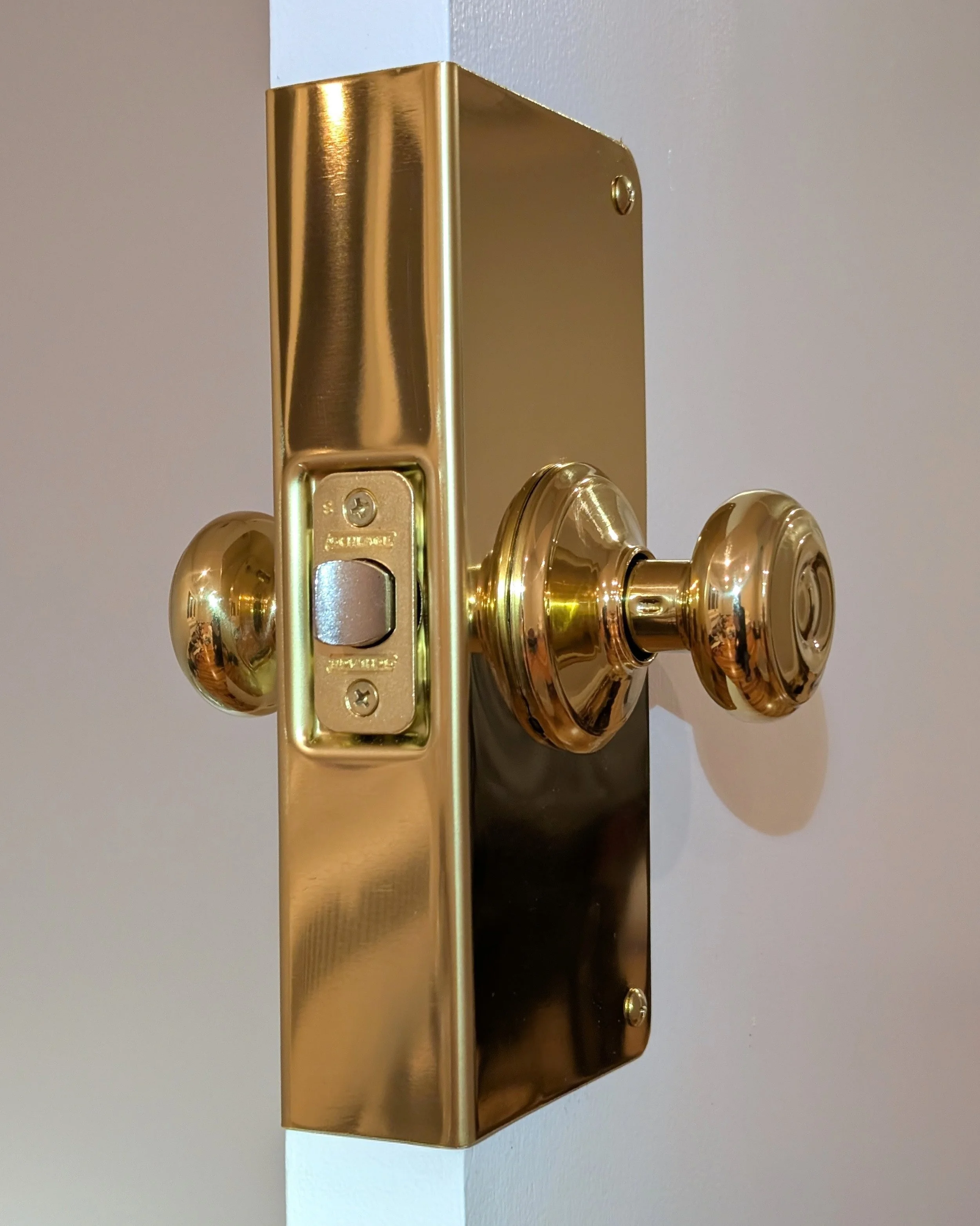 Changing a broken antique lock for a modern high quality doorknob in Newton, MA
