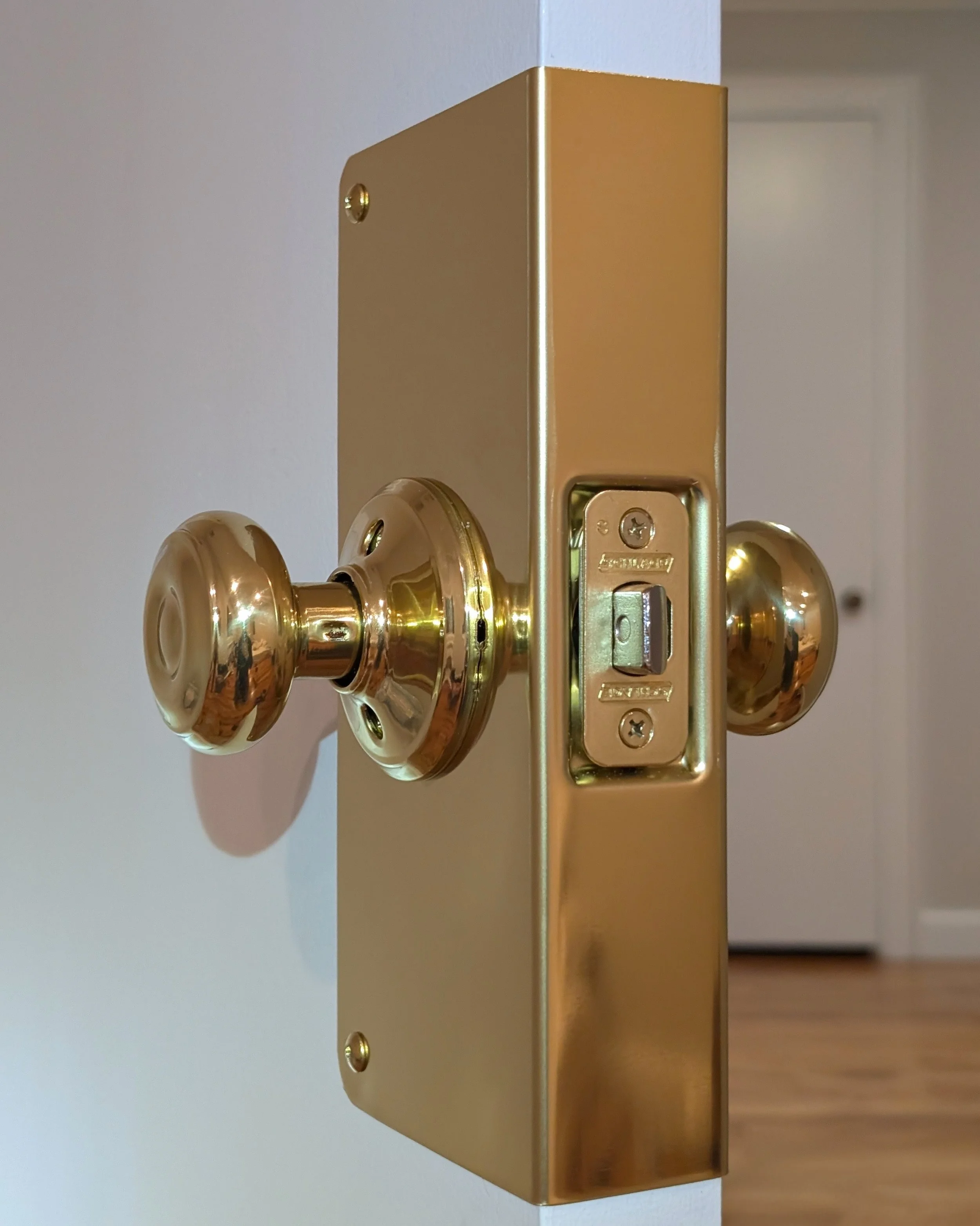 Changing a broken antique lock for a modern high quality doorknob in Newton, MA