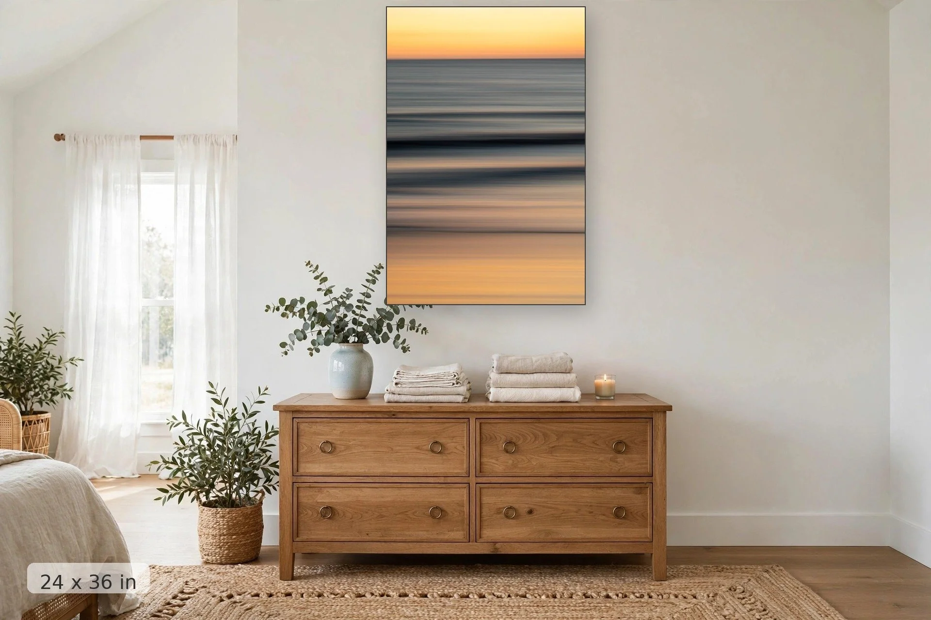 Long exposure photograph of sunset on soft rolling tide during golden hour — Soft Glow print, 24x36 mockup above a dresser