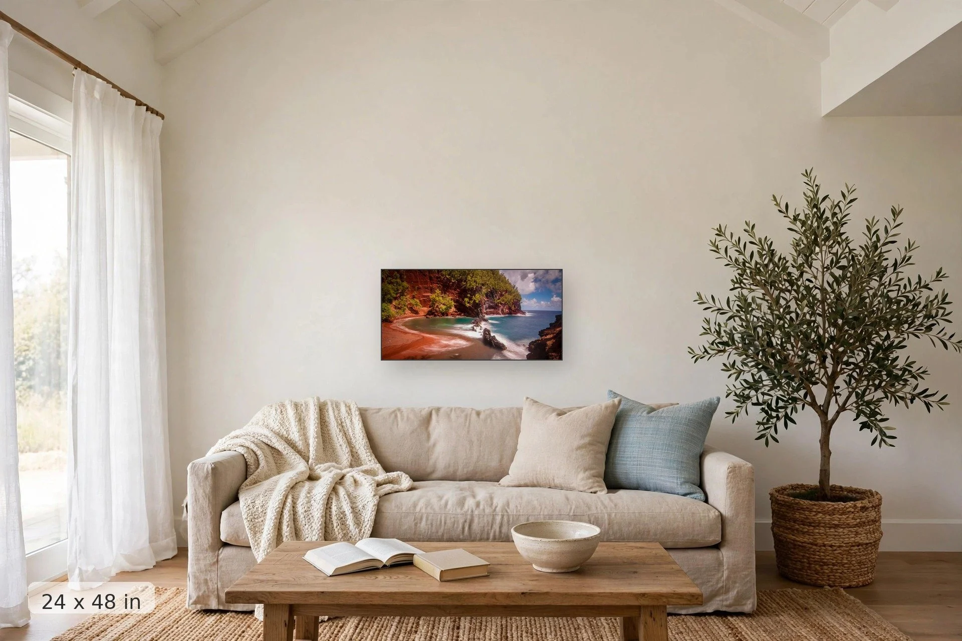 view from above maui's famous red sand beach — Red Sand Beach print, 32x48 mockup above a living room sofa