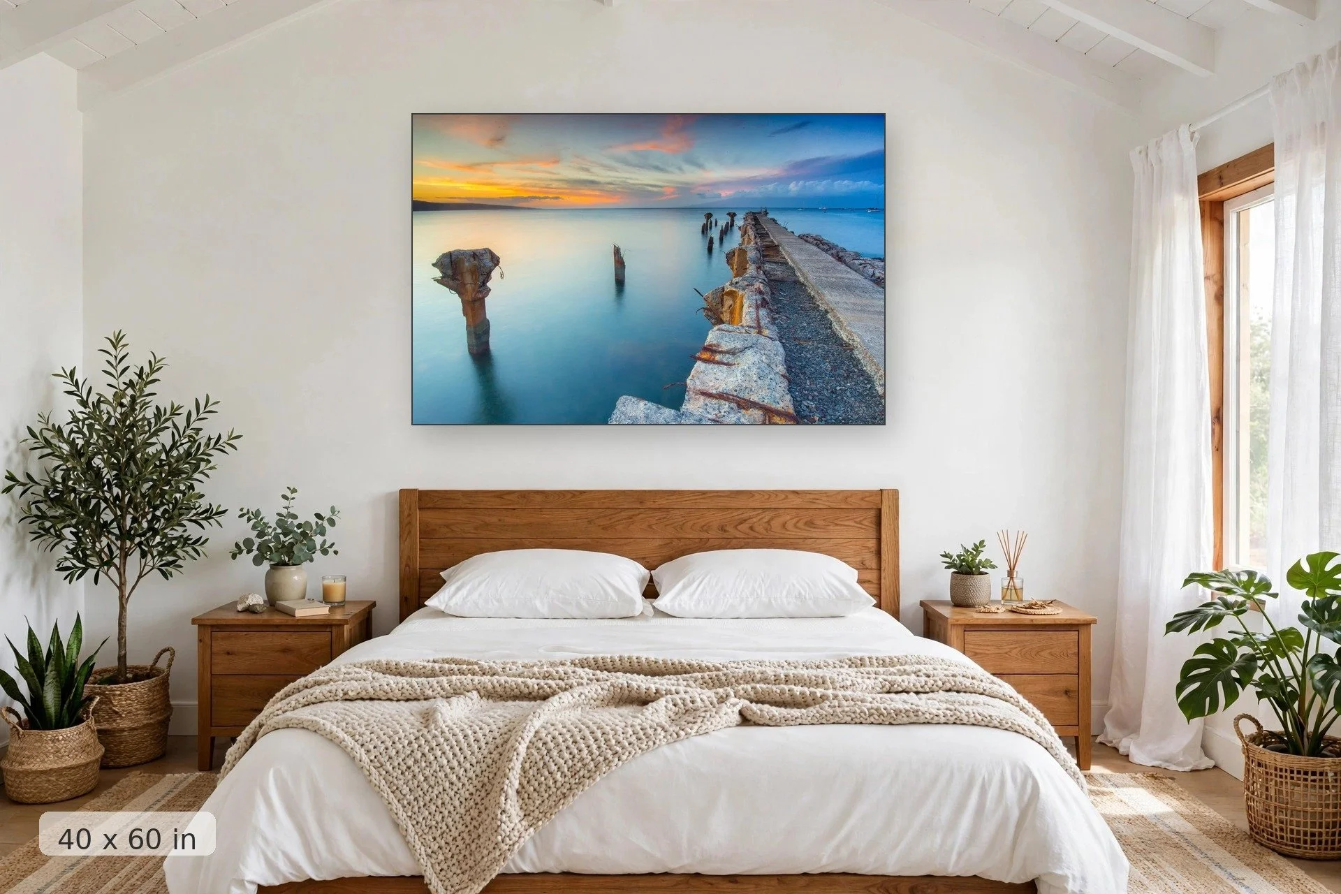 crumbling mala wharf looks out over serene blue water to orange sunset — Mala Remains print, 40x60 mockup above a bedroom headboard
