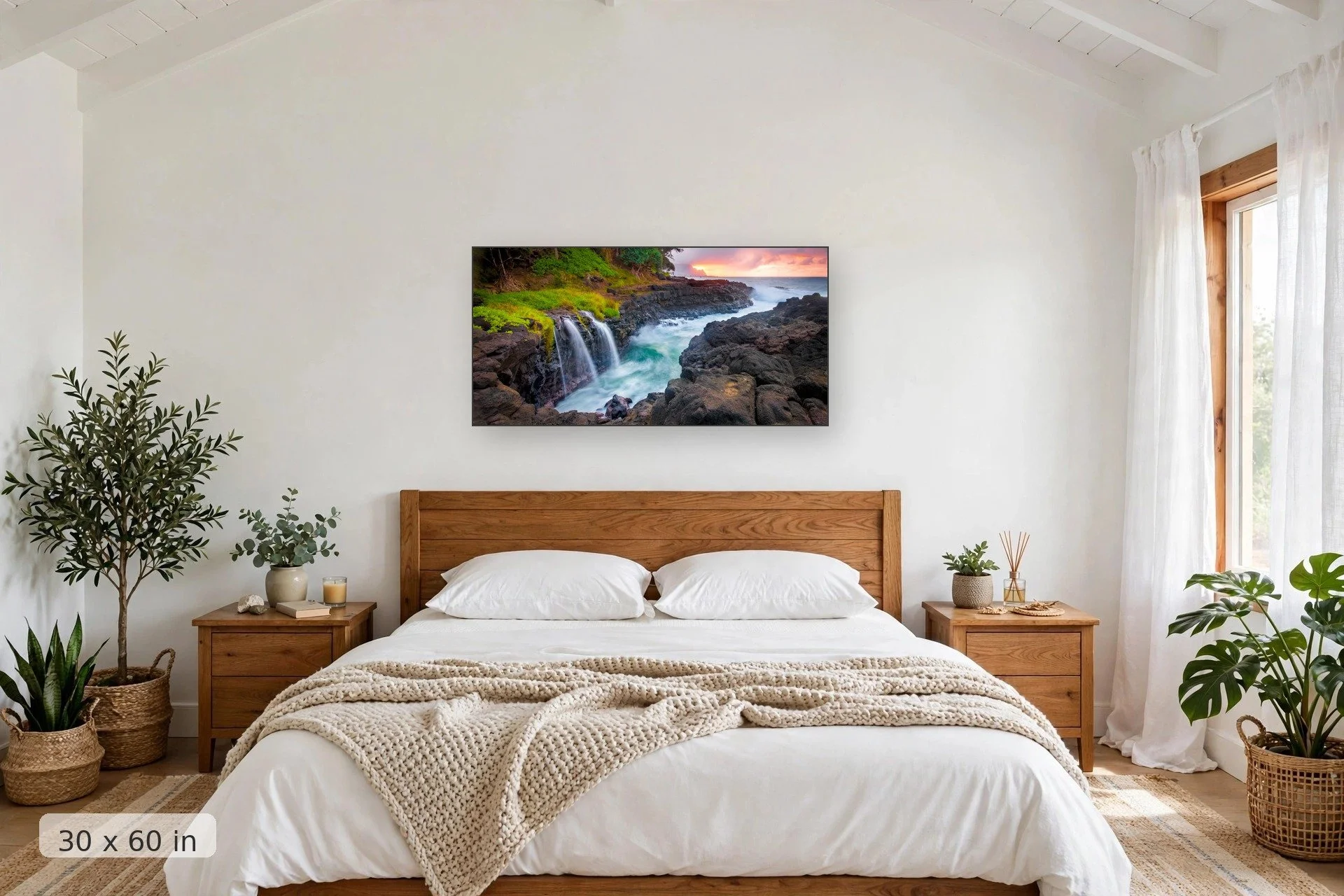 waterfalls pour into swirling waters at queens bath in kauai with pink sunset in background — Queens Bath print, 40x60 mockup above a bedroom headboard