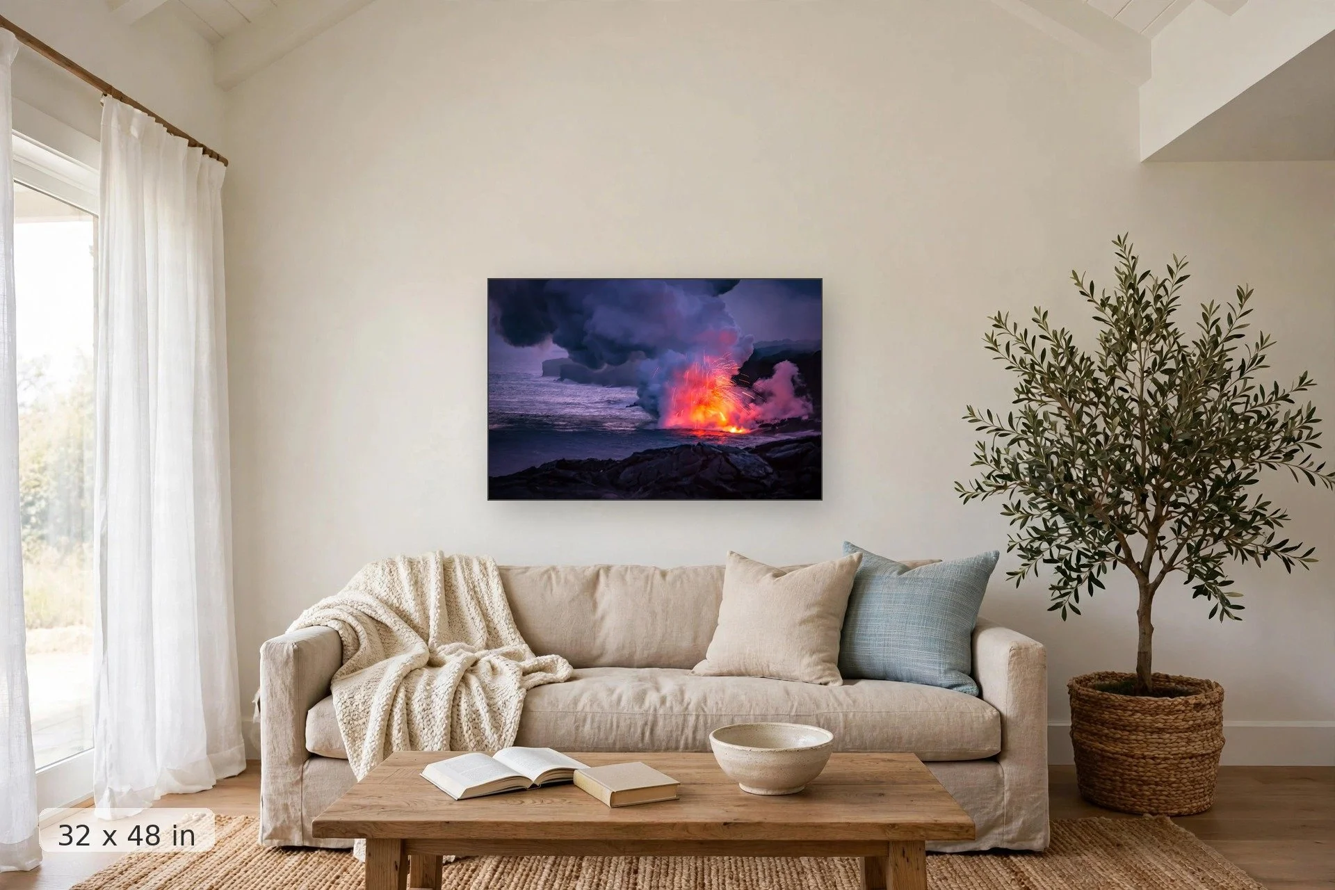 fresh lava spews into the ocean creating a fireworks display as it touches the water — Lava Fireworks print, 32x48 mockup above a living room sofa