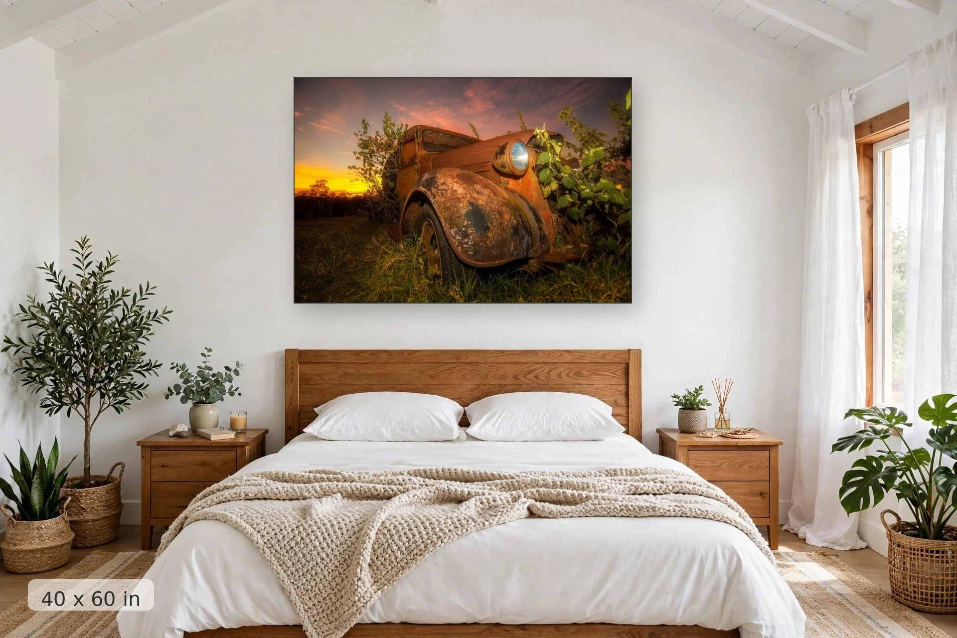 plants overtaking rusty old truck with pink sunset in background — Reclaimed print, 40x60 mockup above a bedroom headboard