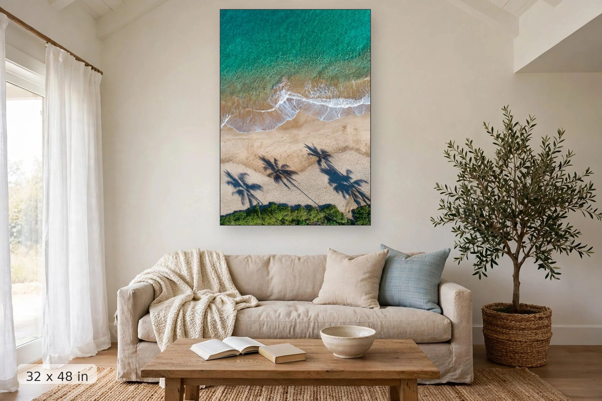 Aerial view of tropical coastline — Aerial Makalua print, 32x48 mockup above a living room sofa