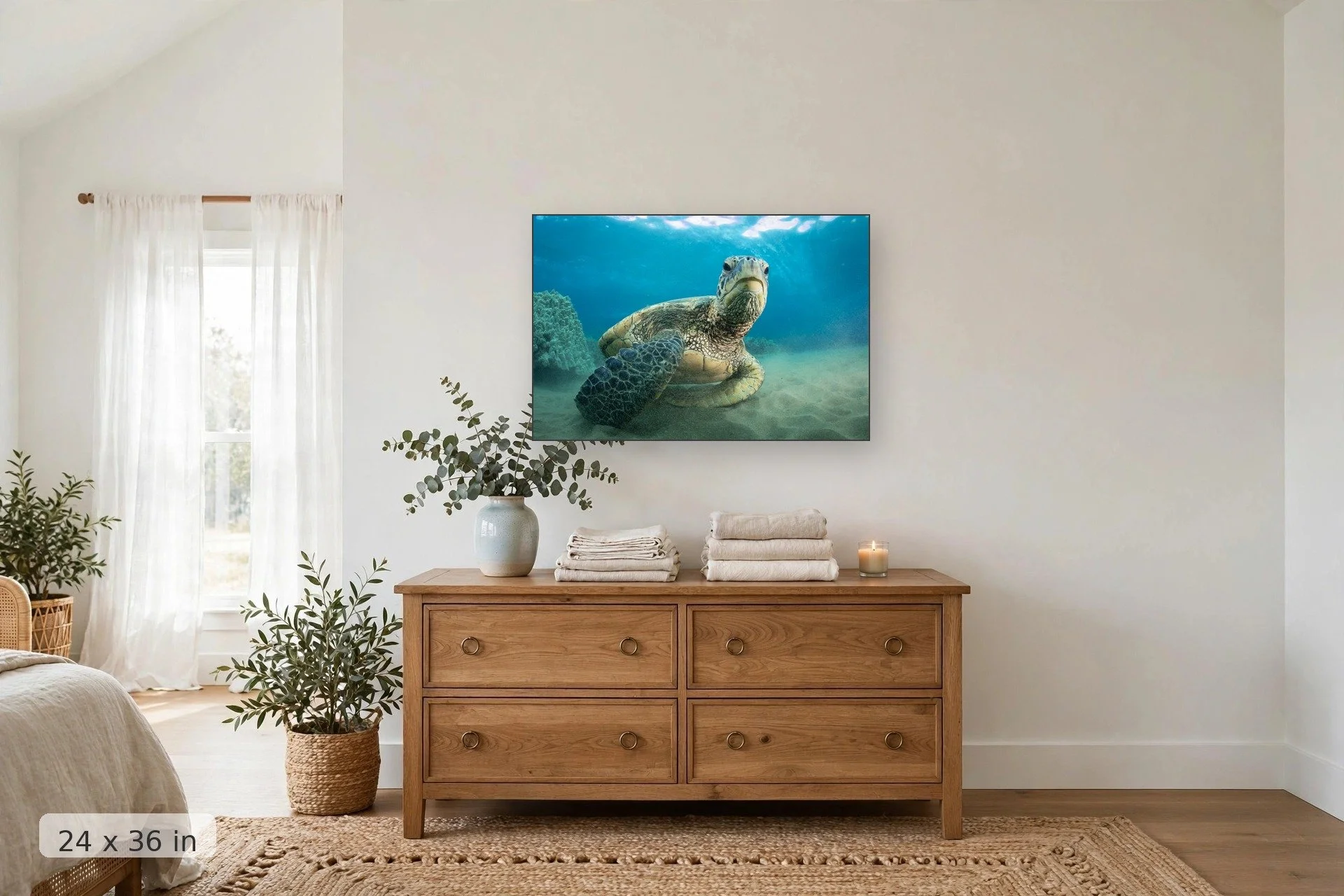 a curious sea turtle hangs out near the camera at the sea floor — Chillin Honu print, 24x36 mockup above a dresser