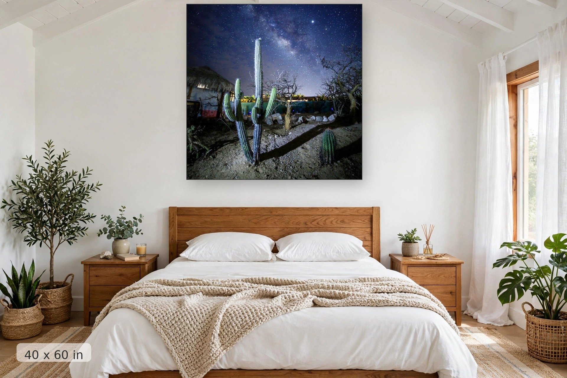 Milky Way galaxy over cactus — Palapas Galaxy print, 40x60 mockup above a bedroom headboard
