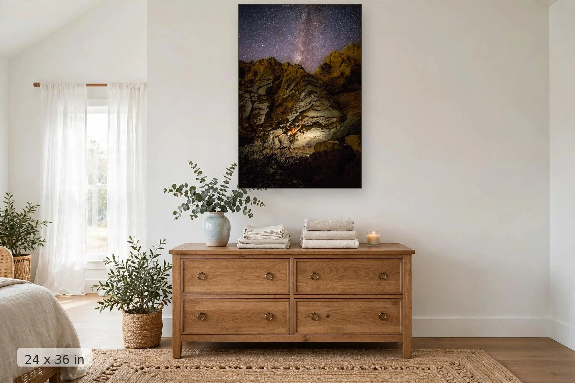 climber bouldering at night under the milky way — Climbing to the Milky Way print, 24x36 mockup above a dresser