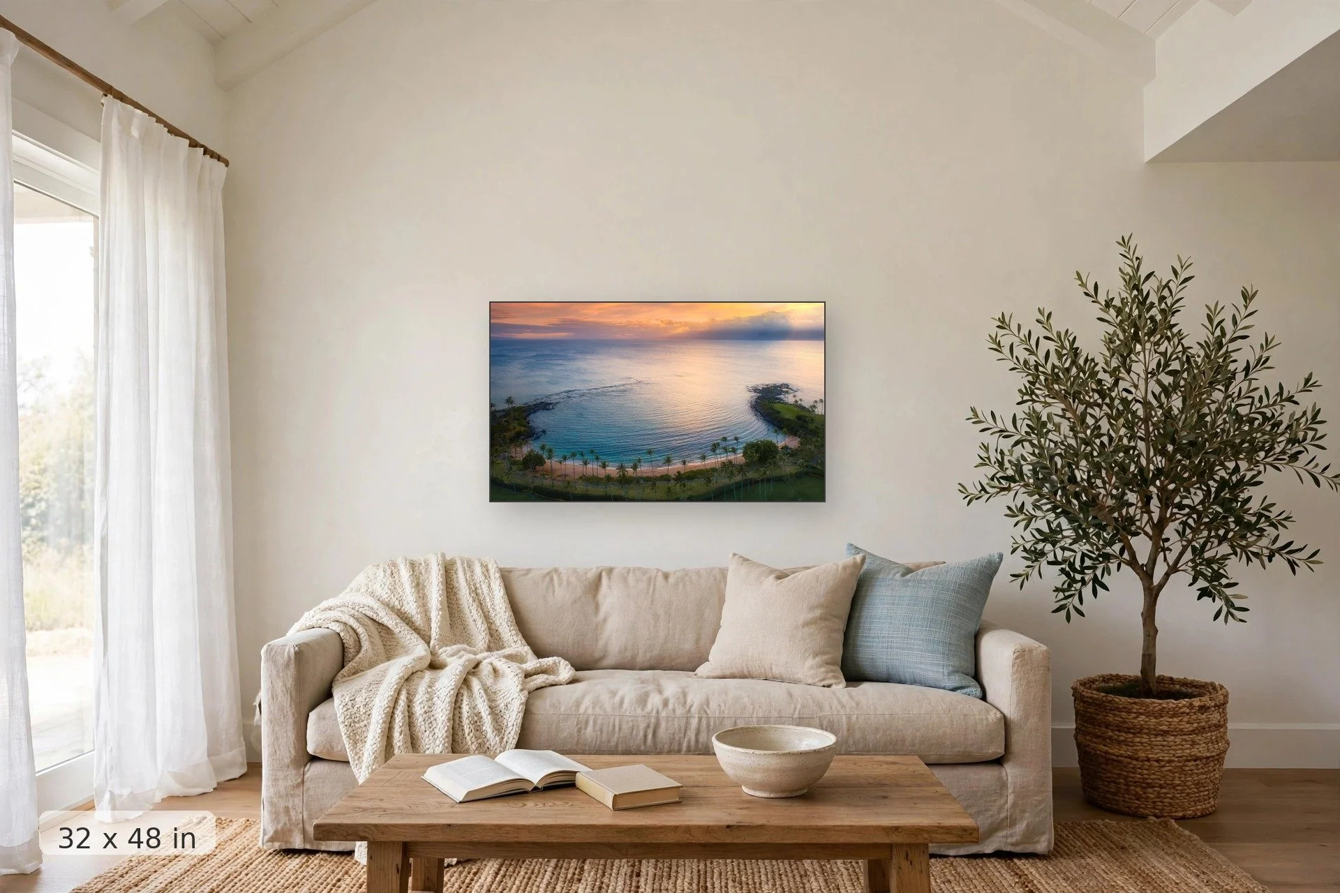 drone view of kapalua bay during sunset showing pastel colors — Kapalua Bay print, 32x48 mockup above a living room sofa