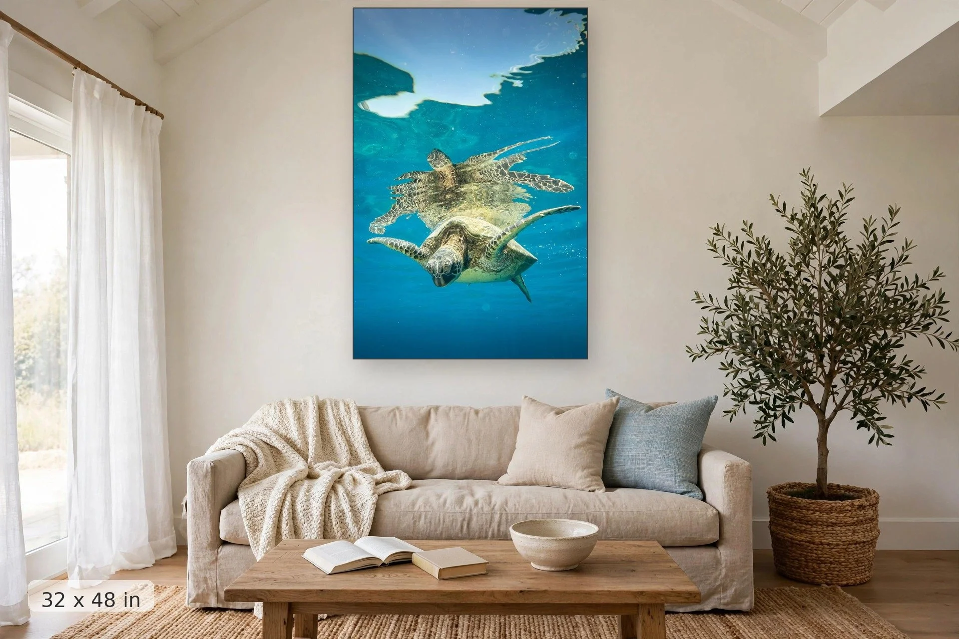 a turtles image reflects along the surface of the water — Mala Honu Reflection print, 32x48 mockup above a living room sofa