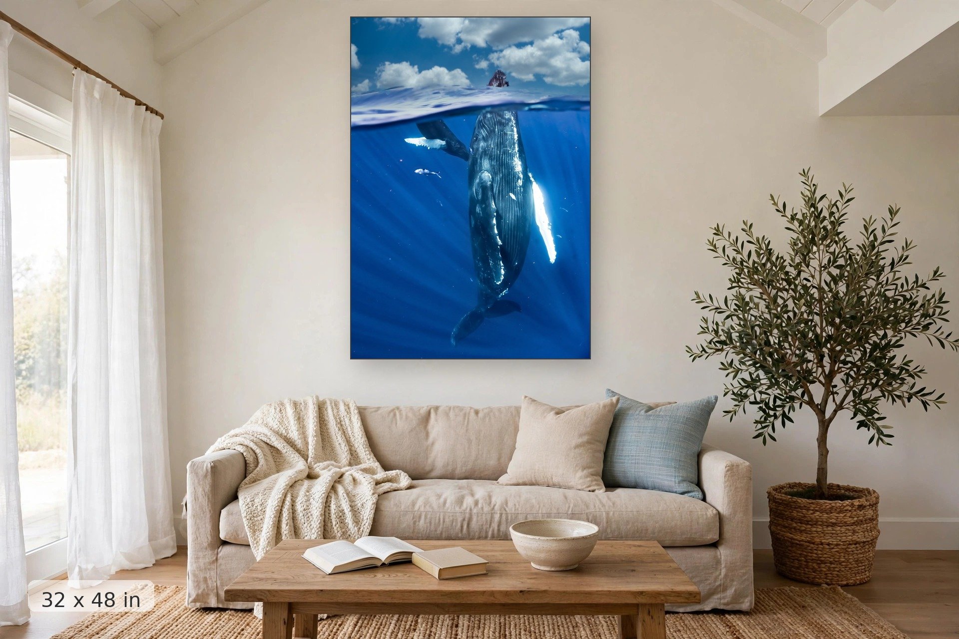 humpback whale mom spyhopping with baby — Mama Spyhop print, 32x48 mockup above a living room sofa