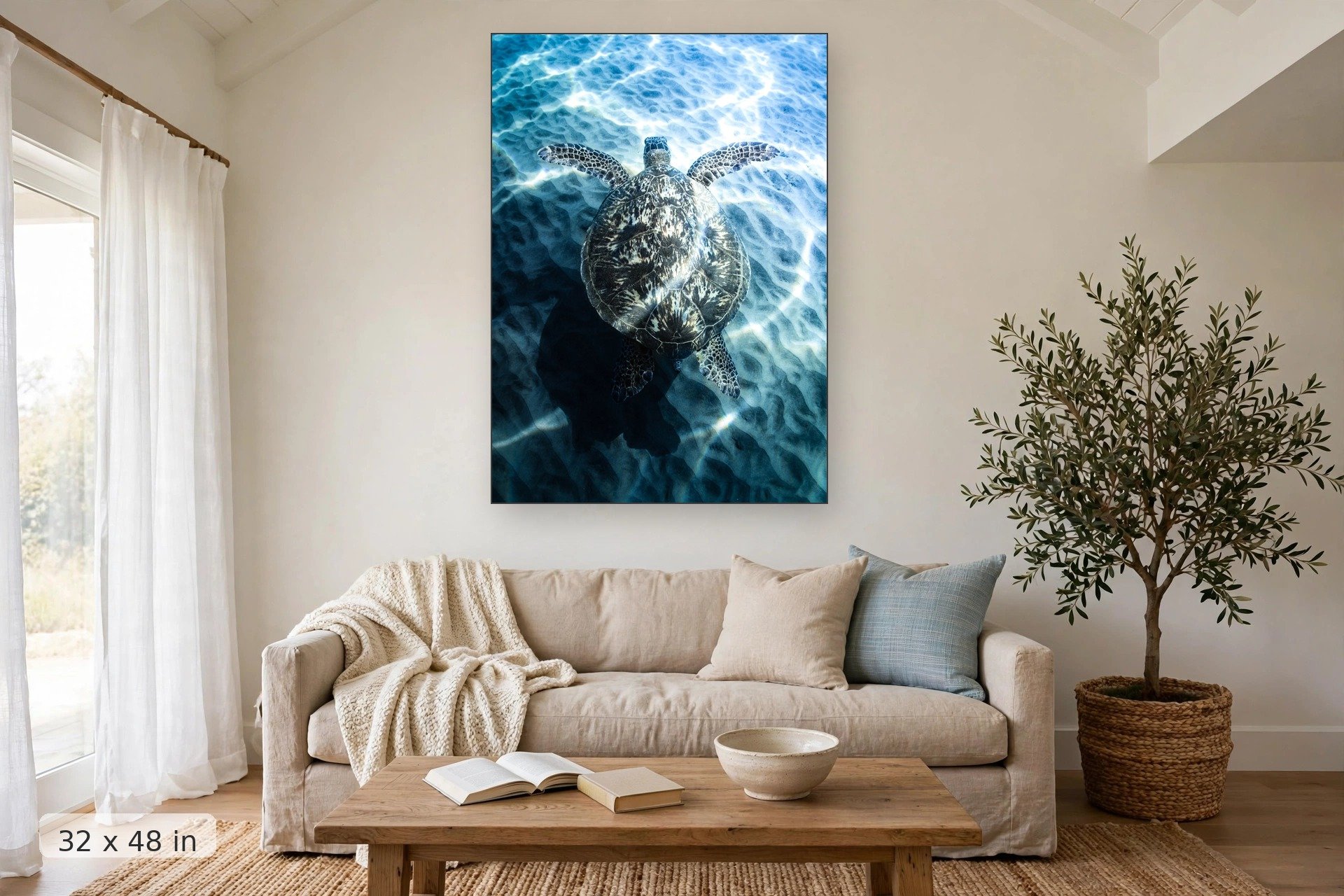 sea turtle glides along ocean bottom with sand and wave patterns texturing photo — Honu Gliding print, 32x48 mockup above a living room sofa