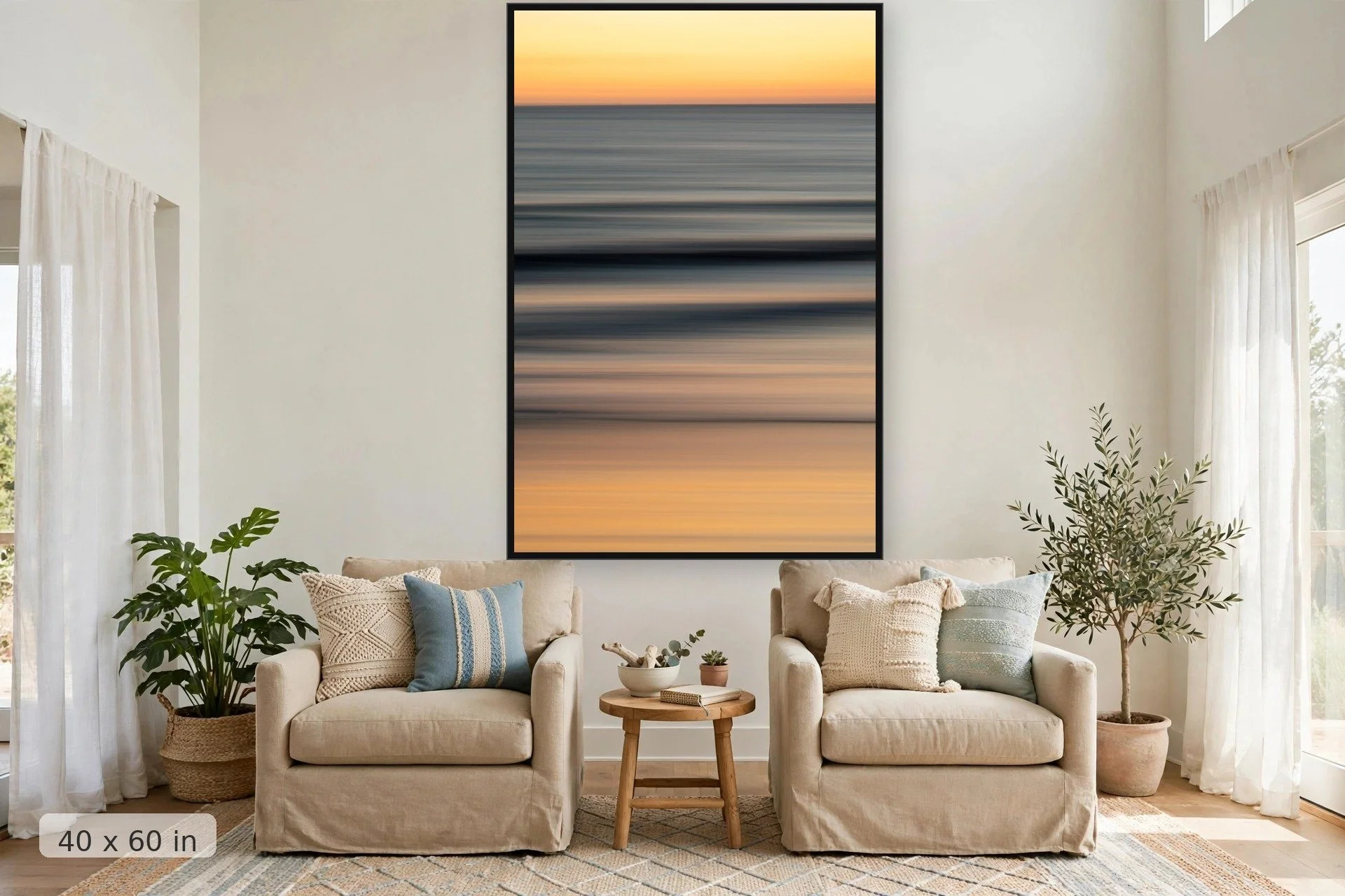 Long exposure photograph of sunset on soft rolling tide during golden hour — Soft Glow print, 40x60 large mockup in a living room