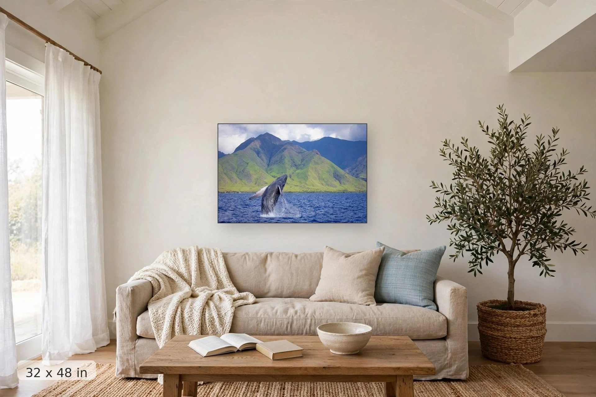 Baby humpback whale breaching with West Maui mountains background — Baby Breach Photo - Baby Humpback Whale in Maui print, 32x48 mockup above a living room sofa