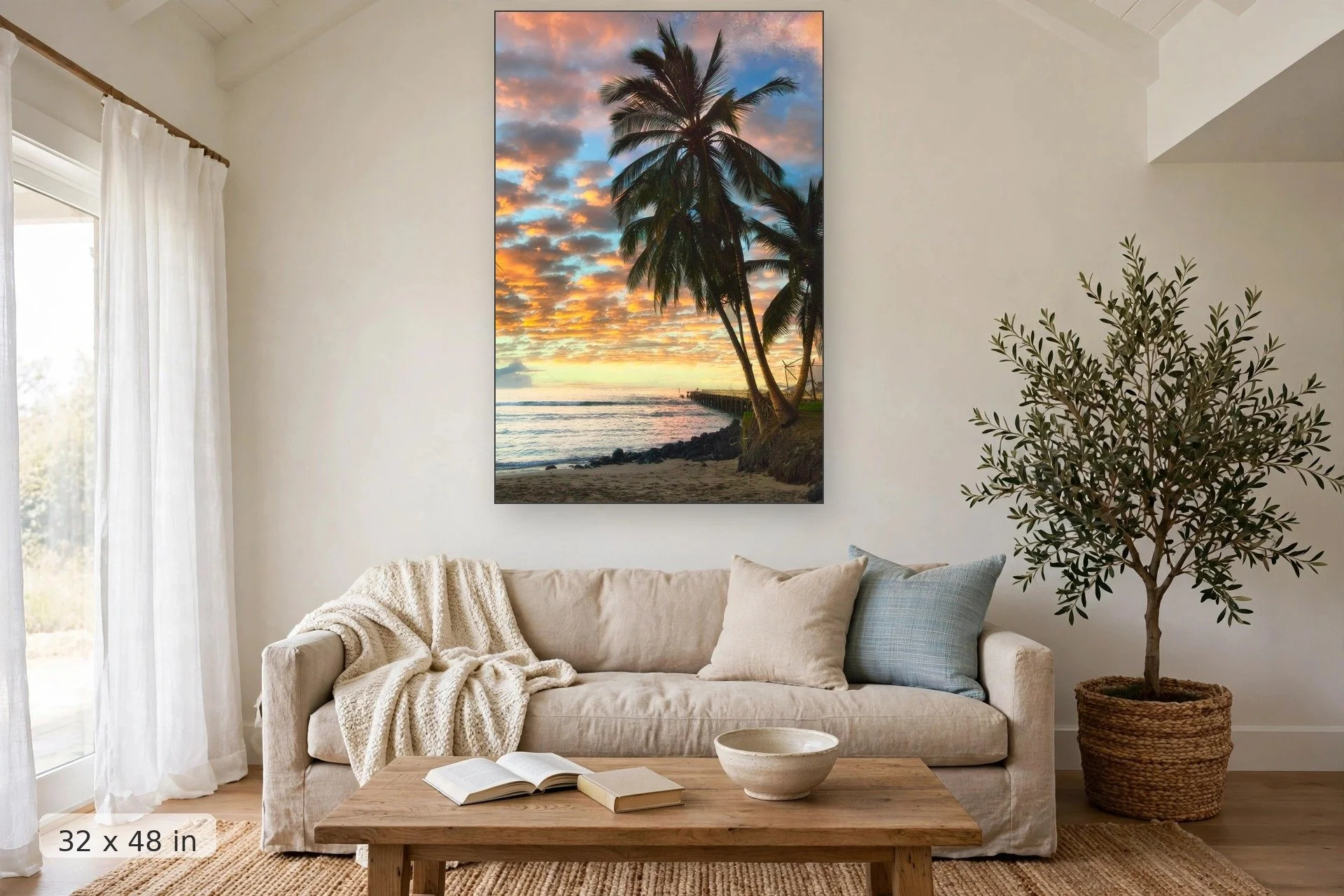 colorful clouds reflect sunset colors over hawaiian beach with large palm trees in foreground — Mala Palms print, 32x48 mockup above a living room sofa