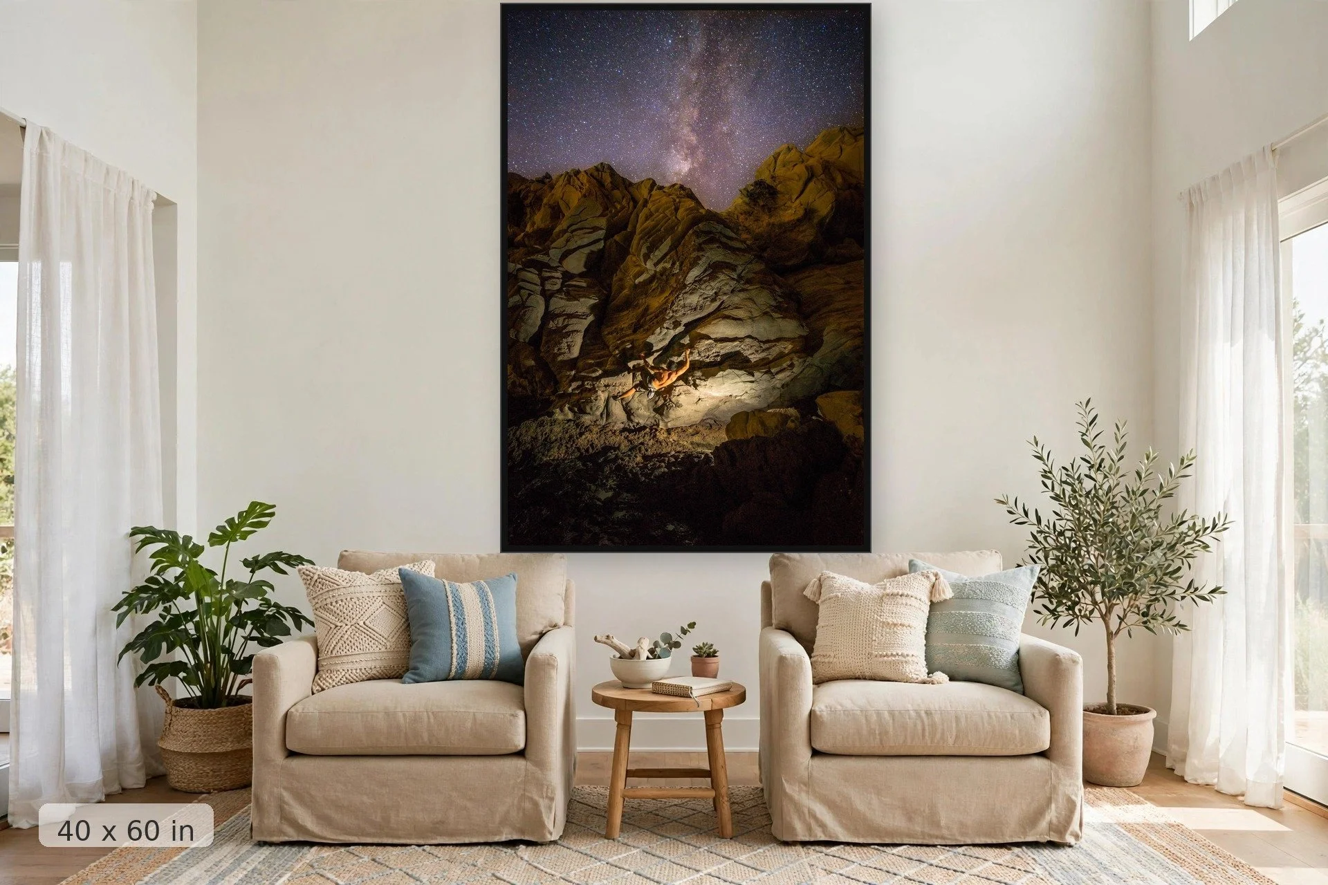 climber bouldering at night under the milky way — Climbing to the Milky Way print, 40x60 large mockup in a living room