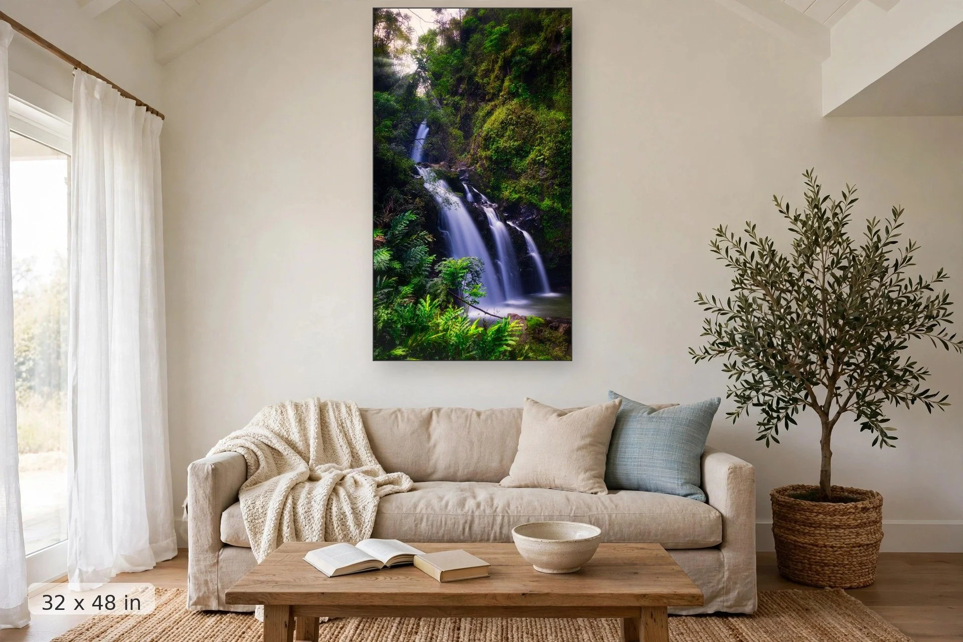 three waterfalls surrounded by lush tropical plants — Three Bears Rays print, 32x48 mockup above a living room sofa