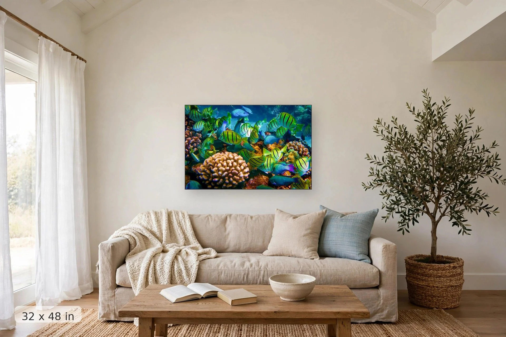 Feeding frenzy on a Hawaii reef — Feeding Frenzy print, 32x48 mockup above a living room sofa
