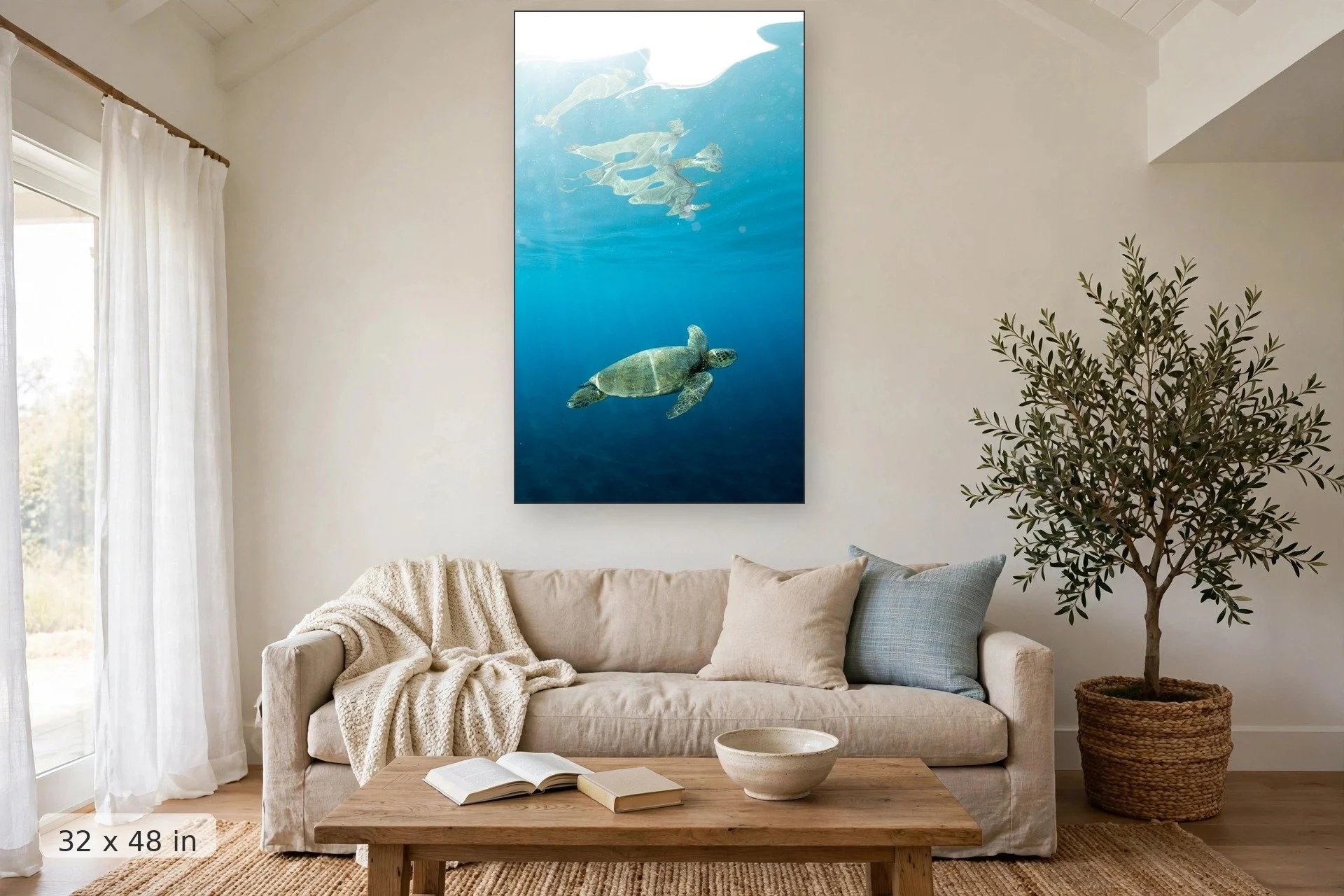 The reflection of a Green Hawaiian Sea Turtle grows larger at it swims closer to the surface — Blue Honu Reflection print, 32x48 mockup above a living room sofa