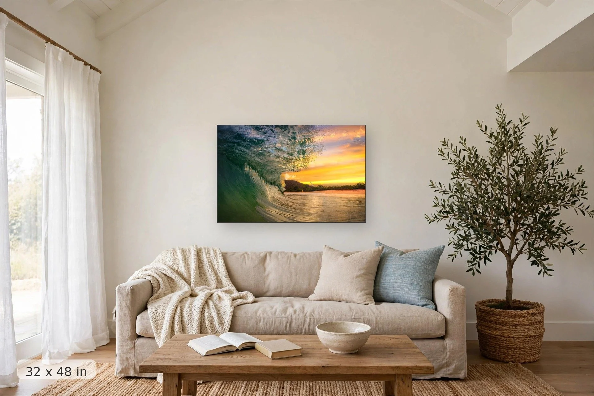 Wave barrel glowing at sunset — Sunset Barrel print, 32x48 mockup above a living room sofa