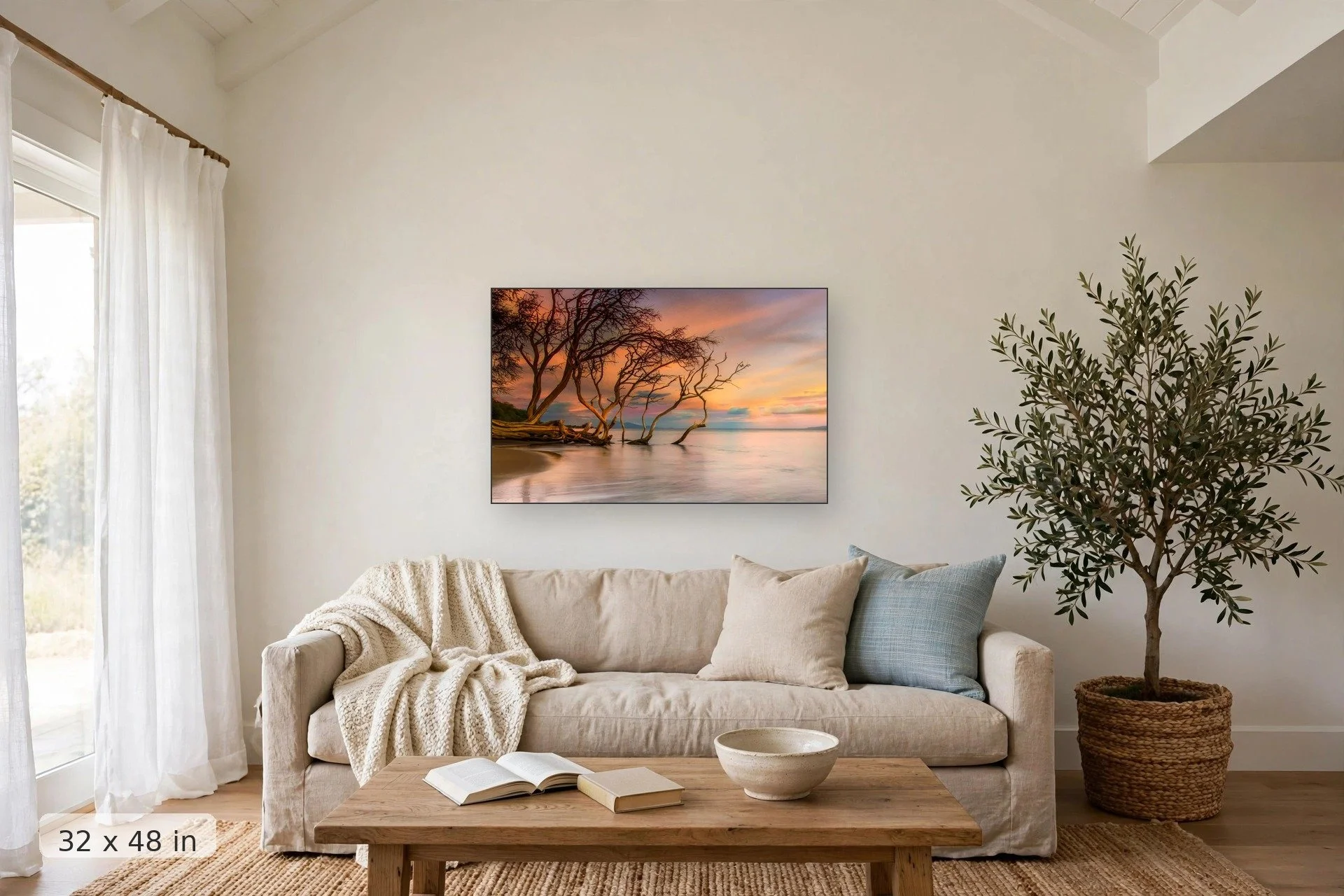 kiawe trees dip into the ocean along the seashore at Olowalu — Olowalu Kiawe print, 32x48 mockup above a living room sofa