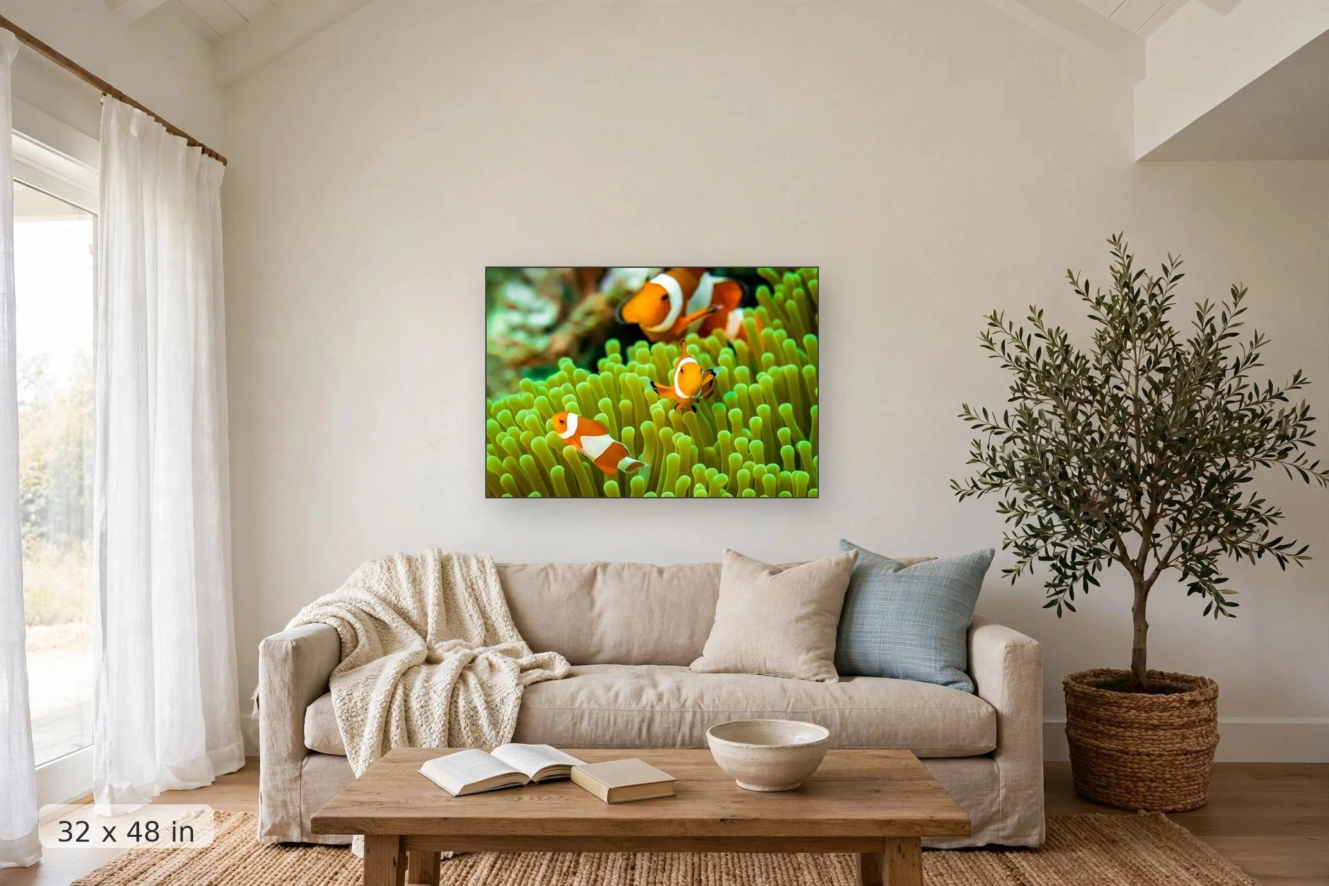 Clownfish family on a coral reef — Family of Clowns print, 32x48 mockup above a living room sofa