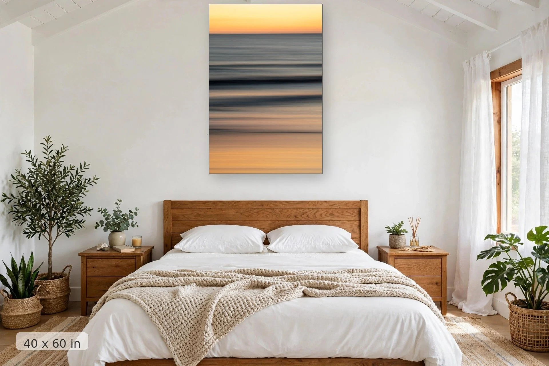 Long exposure photograph of sunset on soft rolling tide during golden hour — Soft Glow print, 40x60 mockup above a bedroom headboard