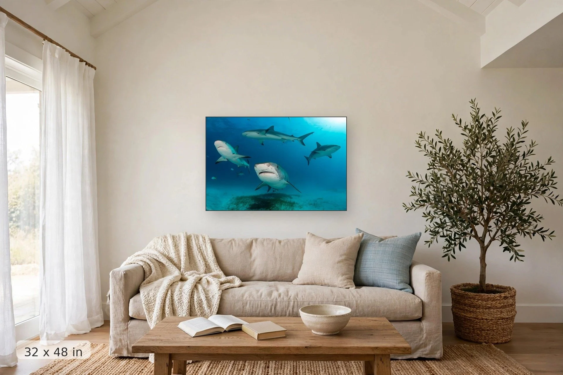 Sharks swimming in formation — Shark Formation print, 32x48 mockup above a living room sofa