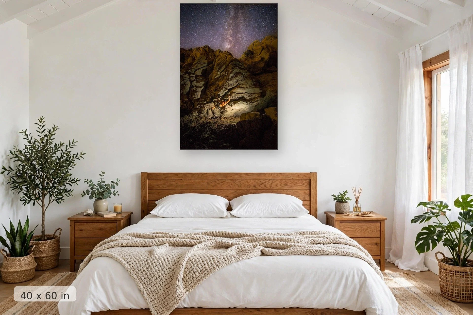 climber bouldering at night under the milky way — Climbing to the Milky Way print, 40x60 mockup above a bedroom headboard