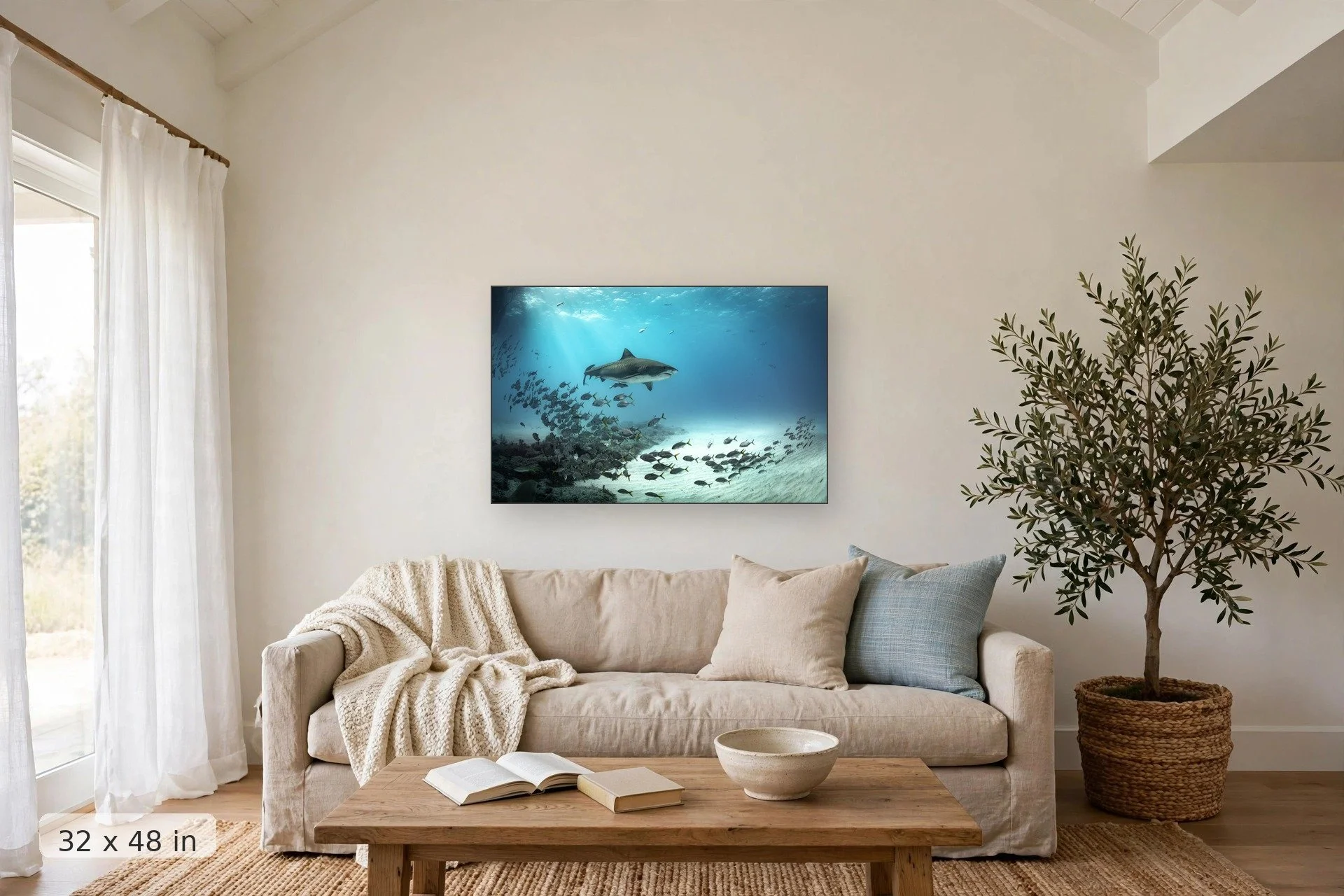 Tiger shark with schooling jack fish — Tiger and Jacks print, 32x48 mockup above a living room sofa