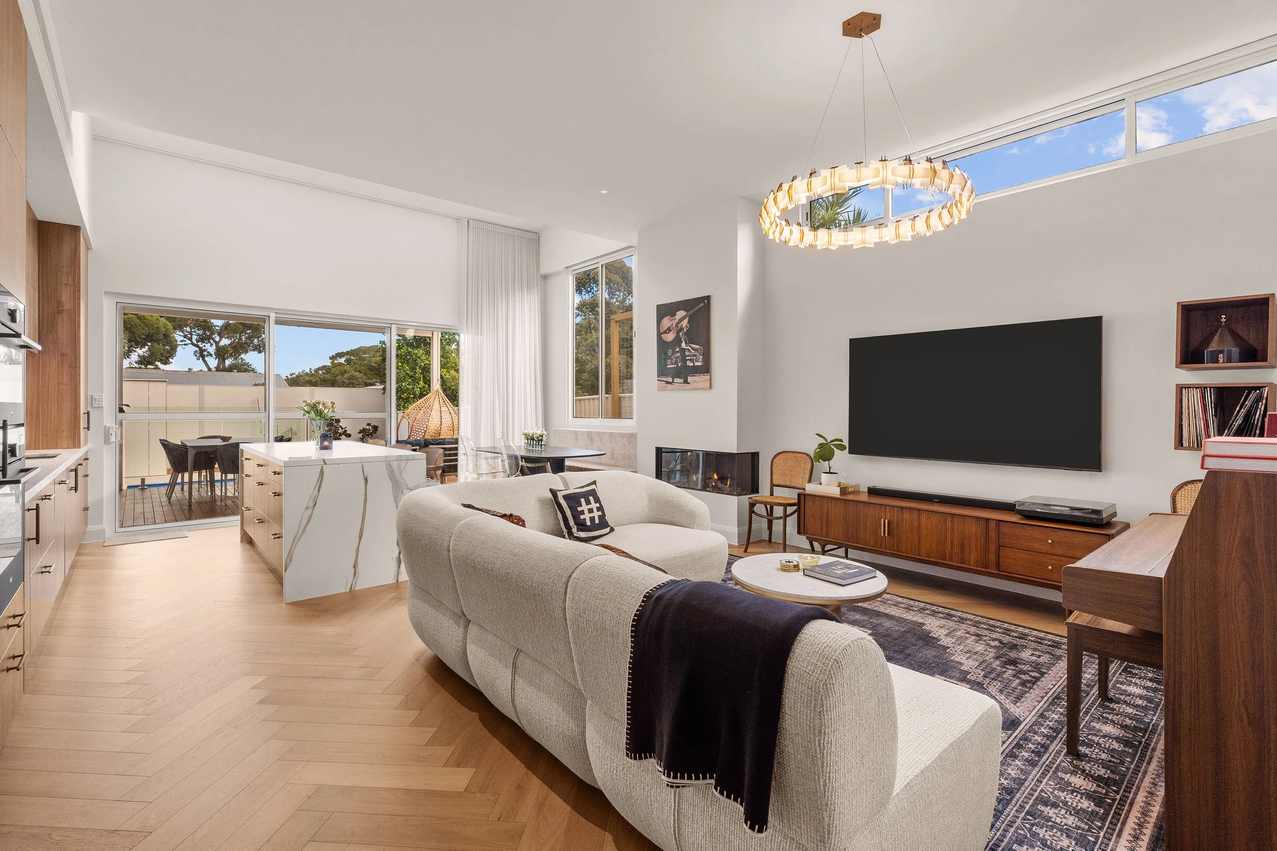 High ceilings and carefully positioned glazing bring light and volume into the heart of the home.