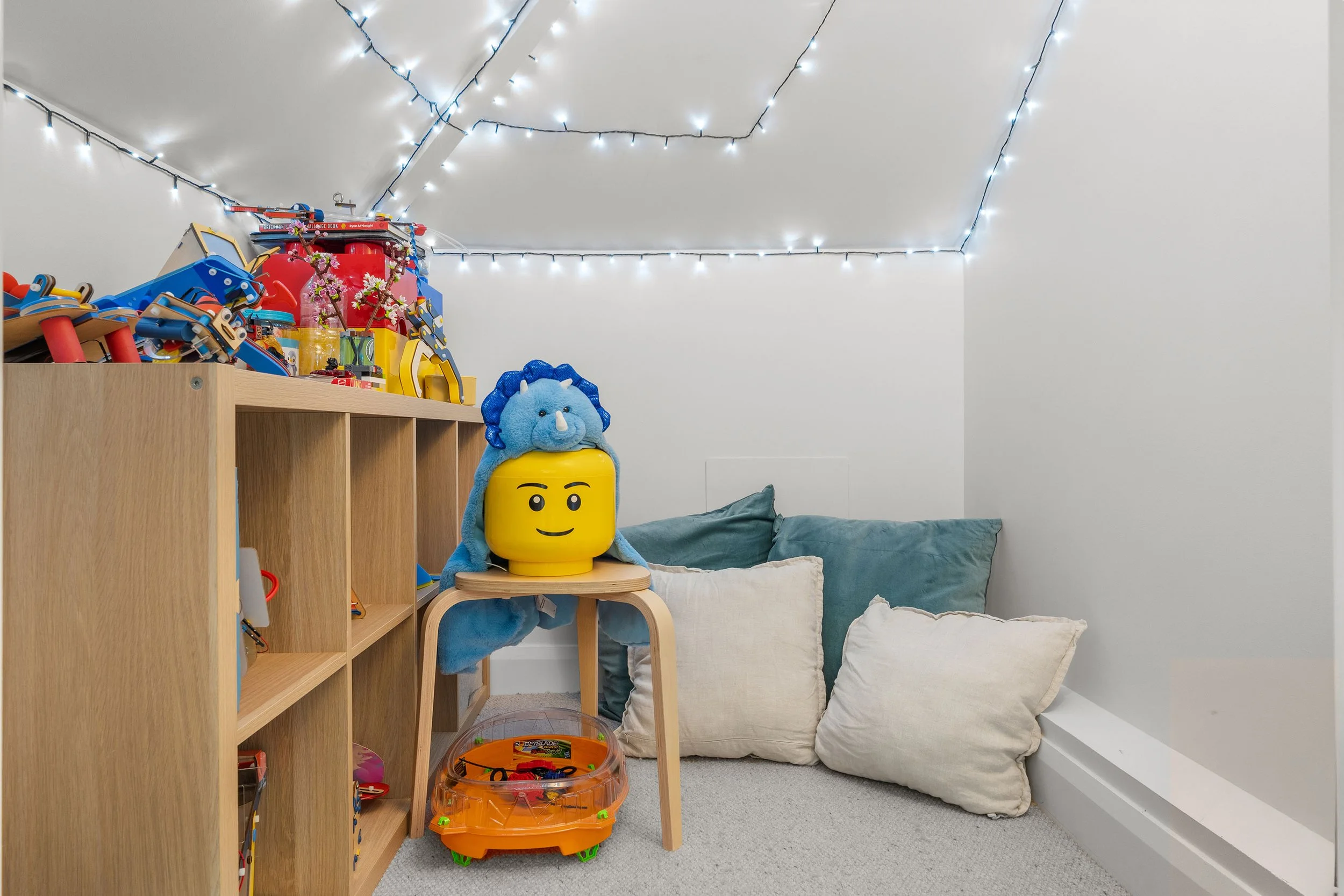 Tucked inside the joinery, this little hideaway was designed for Lego, books, play and imagination.