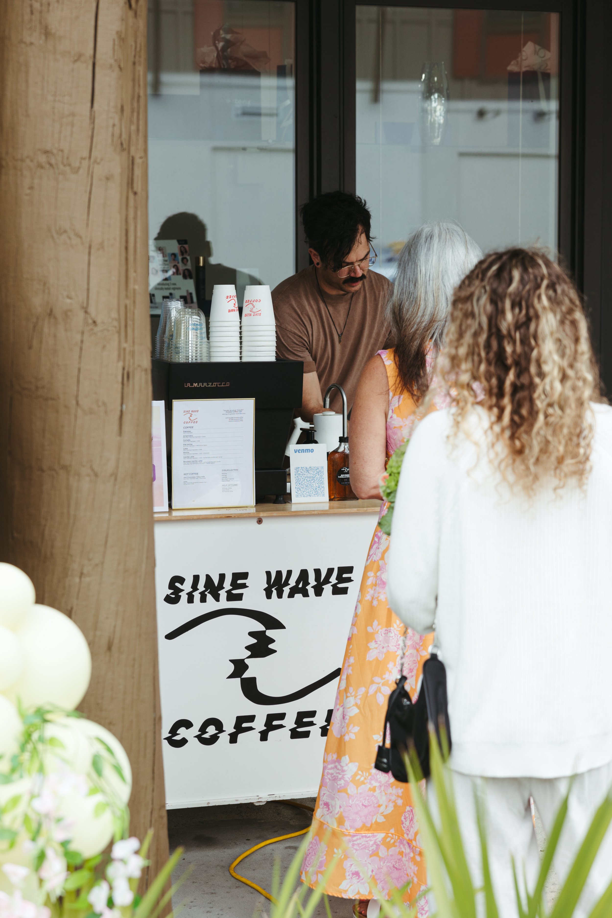 Sine Wave Coffee mobile espresso cart at Jacksonville event; Mobile coffee cart catering at Jacksonville wedding reception; Anthony Brewer, owner of Sine Wave Coffee, Jacksonville FL; Sine Wave Coffee coffee cart setup at corporate event Jacksonville