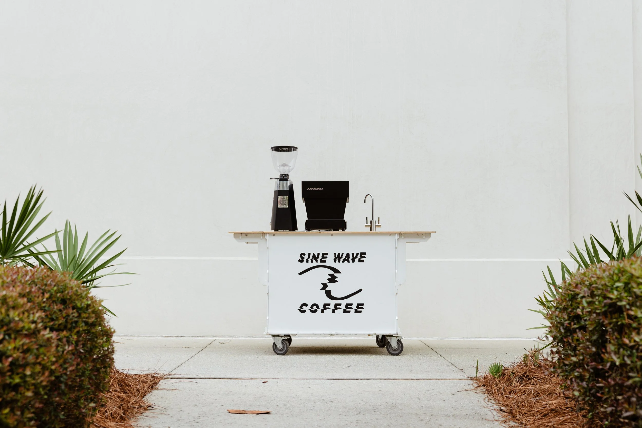 Sine Wave Coffee mobile espresso cart at Jacksonville event; Mobile coffee cart catering at Jacksonville wedding reception; Anthony Brewer, owner of Sine Wave Coffee, Jacksonville FL; Sine Wave Coffee coffee cart setup at corporate event Jacksonville