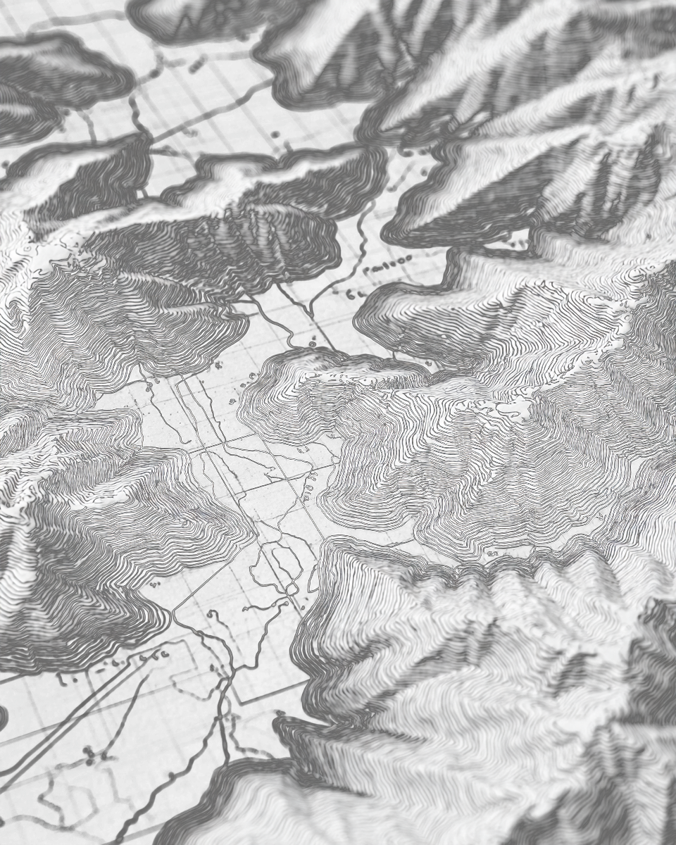 Close-up of a black and white topographic map with contour lines showing elevation.