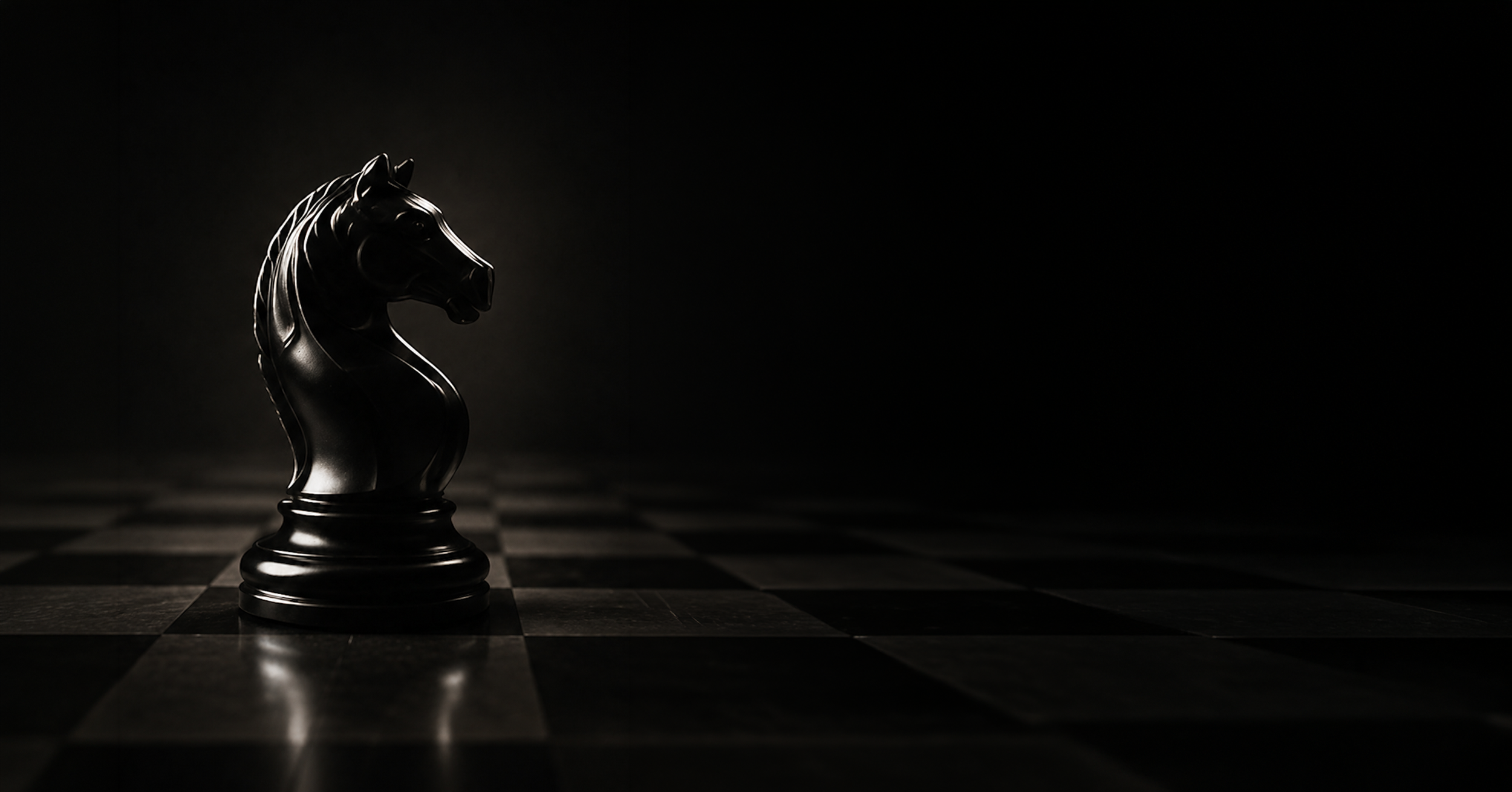 Black knight chess piece on a chessboard with dramatic lighting creating shadows.