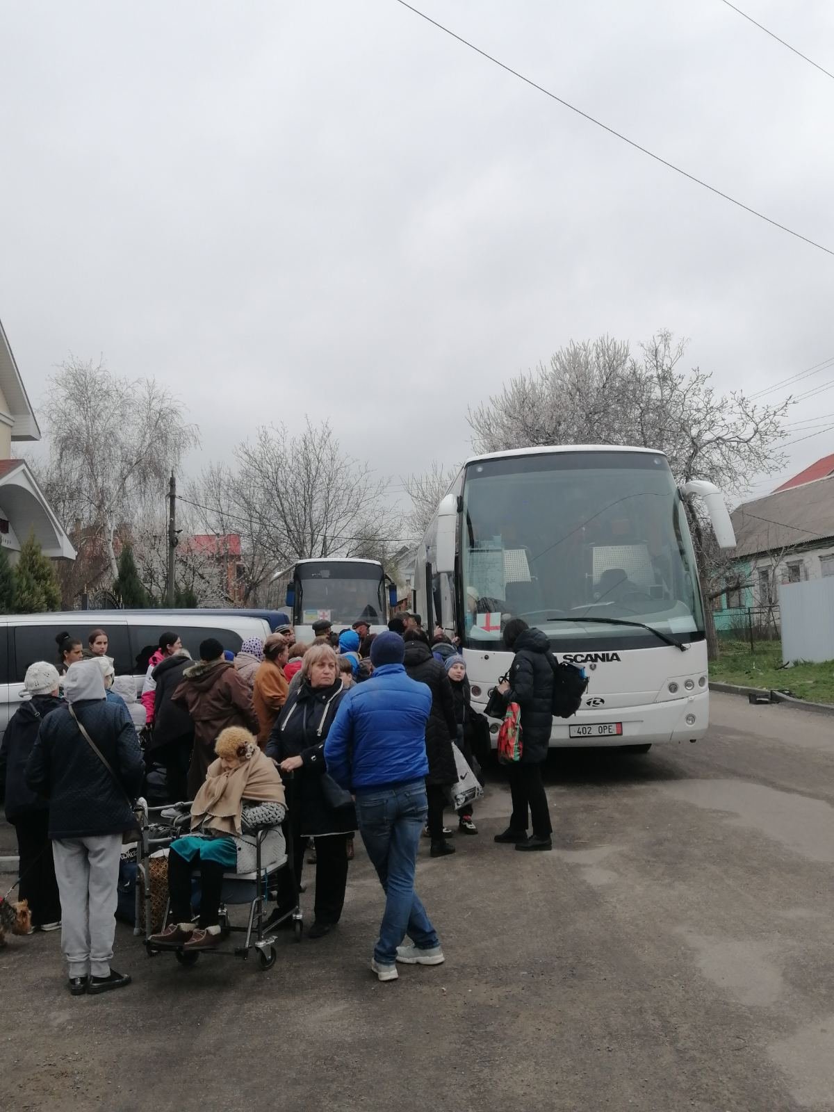 Evacuees getting settled in bus to Rivne