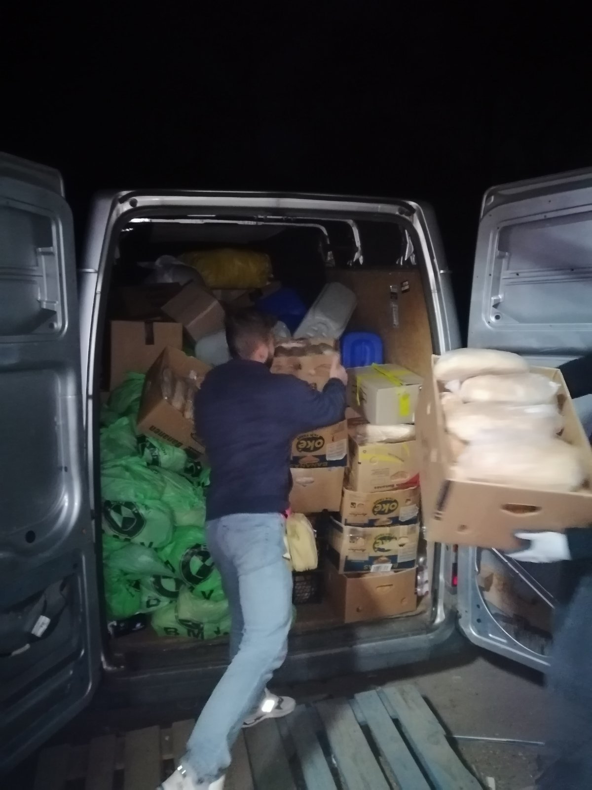 Unloading food items at the church in Zaporizhzhia