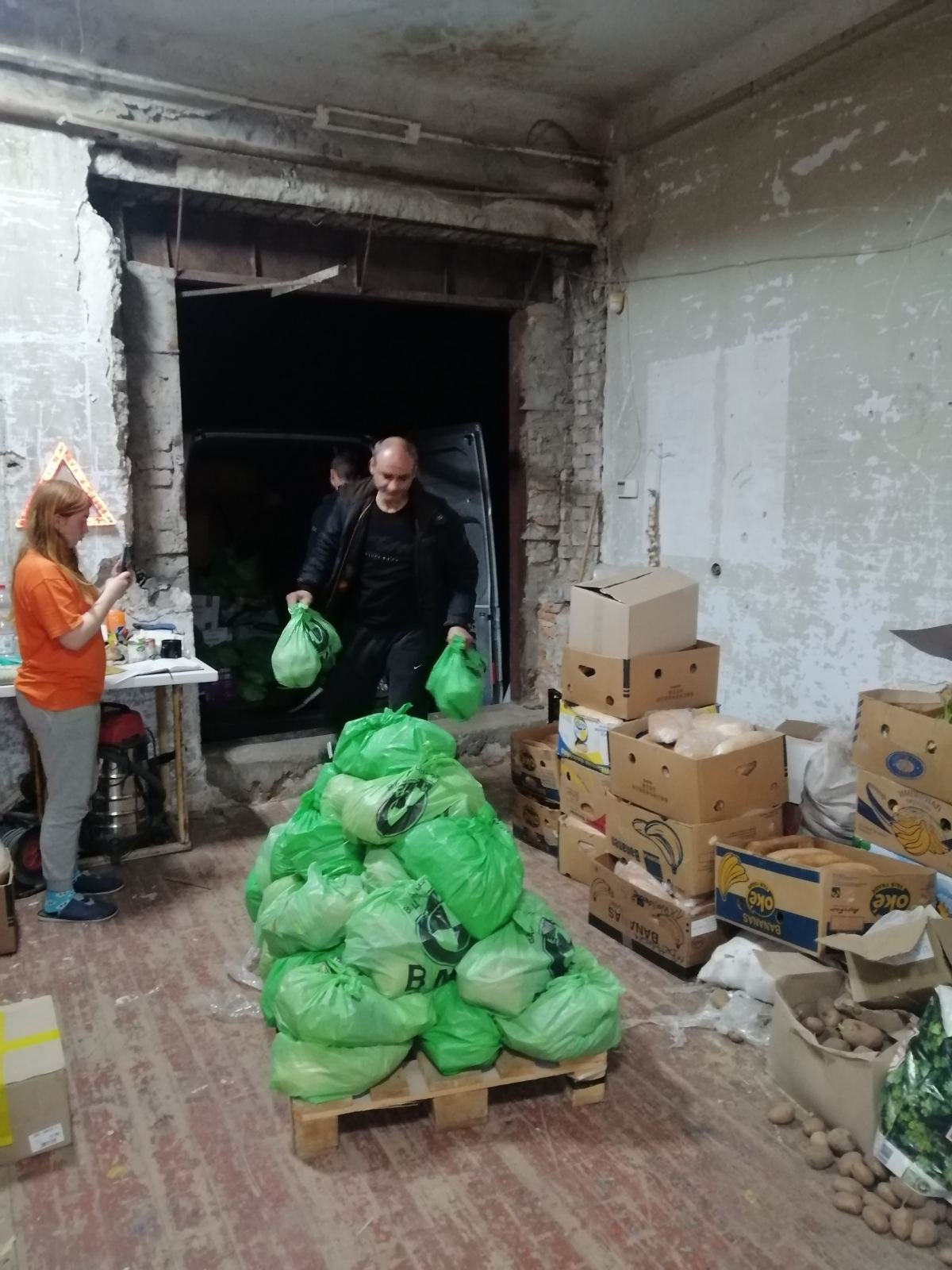 Unloading food items at the church in Zaporizhzhia