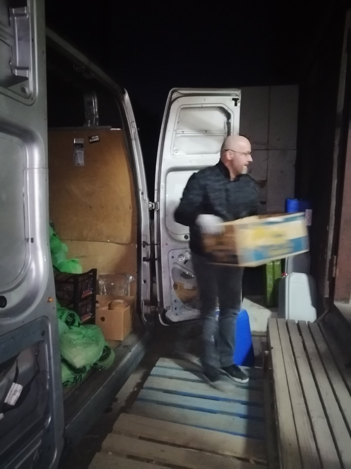 Unloading food items at the church in Zaporizhzhia