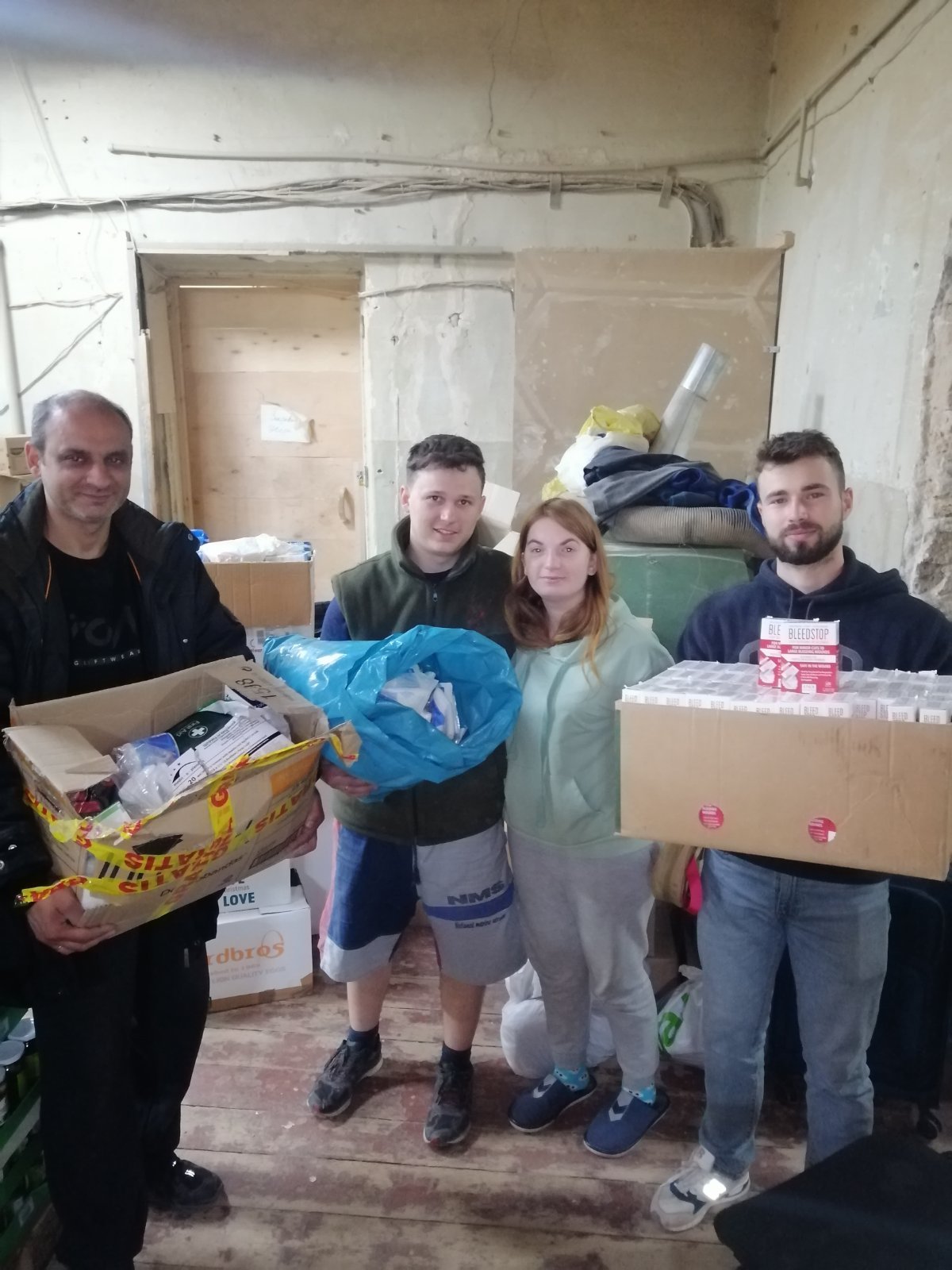 Volunteers unloading food items delivered to the church in Zaporizhzhia