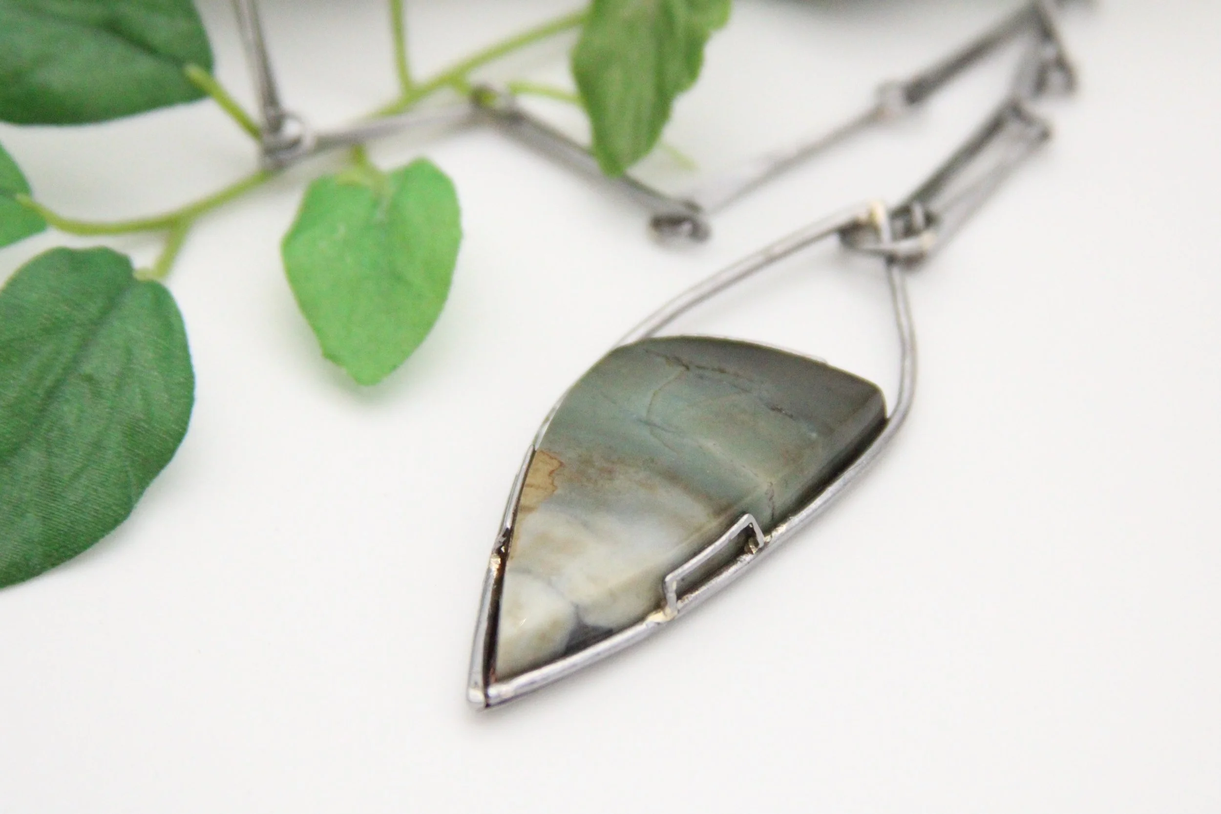Hand fabricated opalized wood stone pendant necklace in low carbon steel with handmade flat bar chain