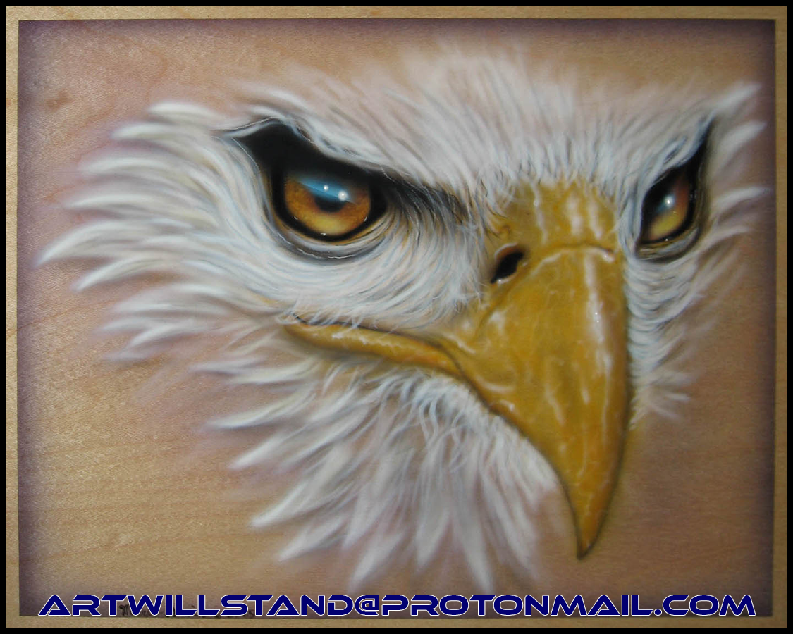 Eagle head on wood.png