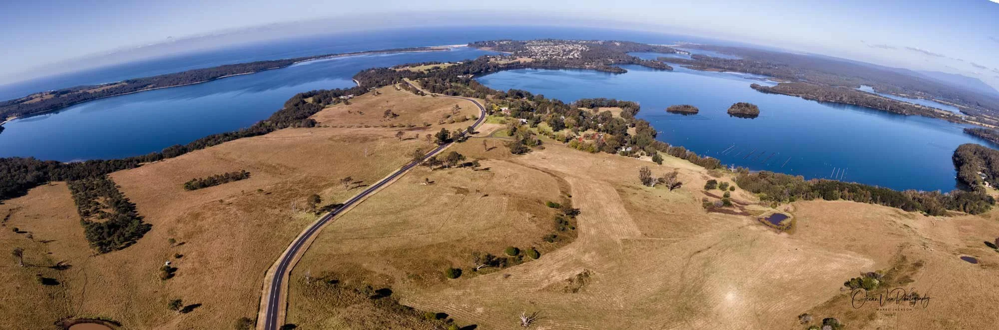 Tuross Head NSW - road into Tuross Head, showing Coila Lake, Tuross River & Ocean