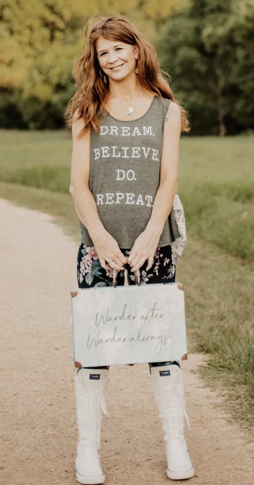 Woman on a path embracing freedom, courage, and the journey of becoming God’s masterpiece.