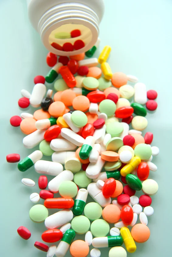 When should you start medication therapy for Parkinson's disease