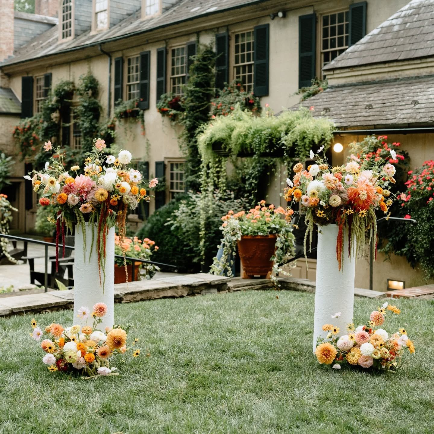 This ceremony install was a group effort of the best sorts. Family members made the columns, on site gardeners weighed them down, and the look came together beautifully with the best local blooms sourced from growers around the county. 

When you are