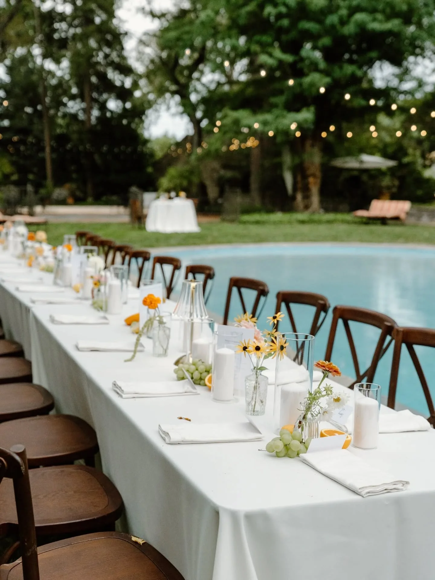 A moment for the bud vases, in all their iterations!

No matter what color palette or overall vibe you are going for on your day- you really can't go wrong with a little touch of flowers on the guest tables. 

Put them in cute little vases or make th